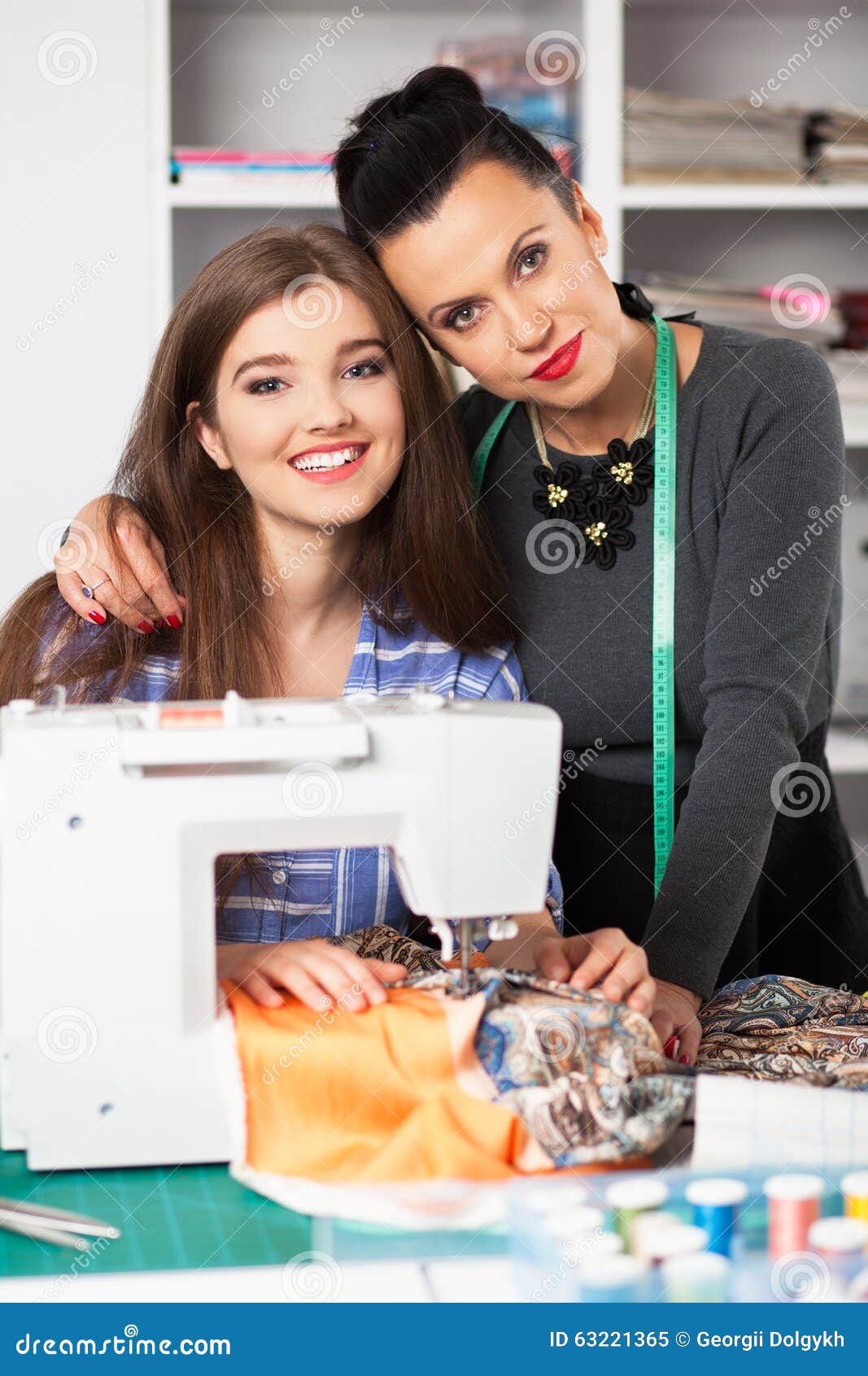 Women in a sewing stock image. Image of attractive 63221365