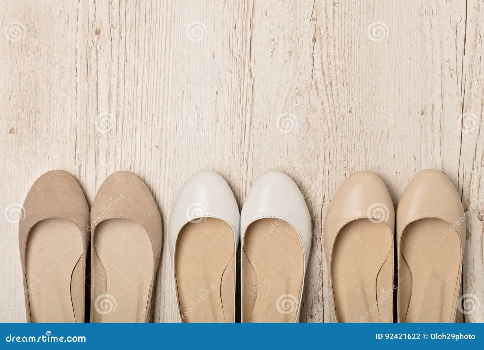 Women Shoes Ballet Flats White and Beige on a Light Wooden Bac Stock ...