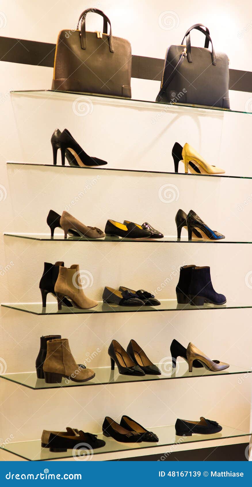 Women shoes on rack stock image. Image of objects, colorful 48167139