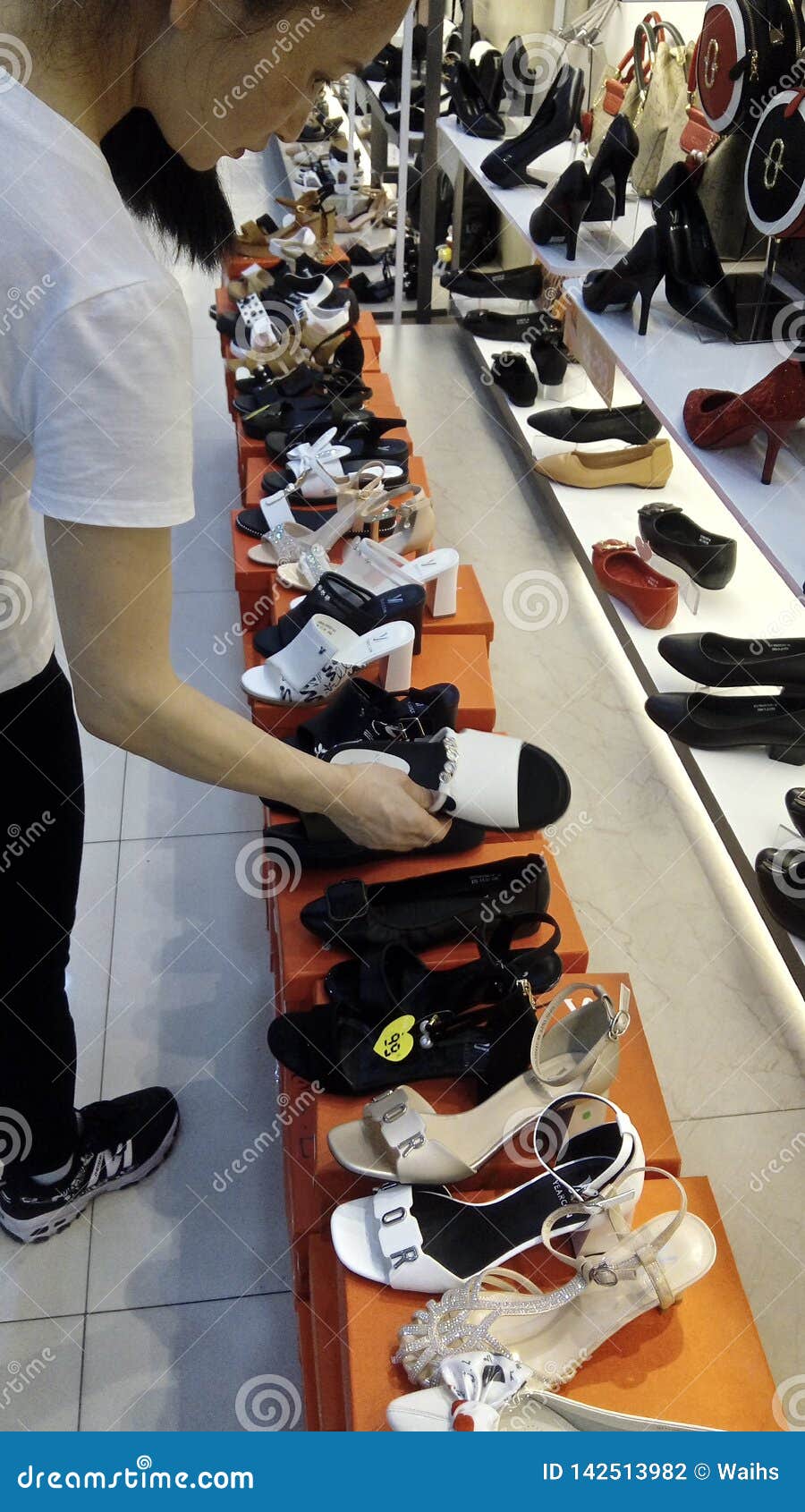 Shenzhen, China: Women Shop at a Shoe or Clothing Store or Women`s ...