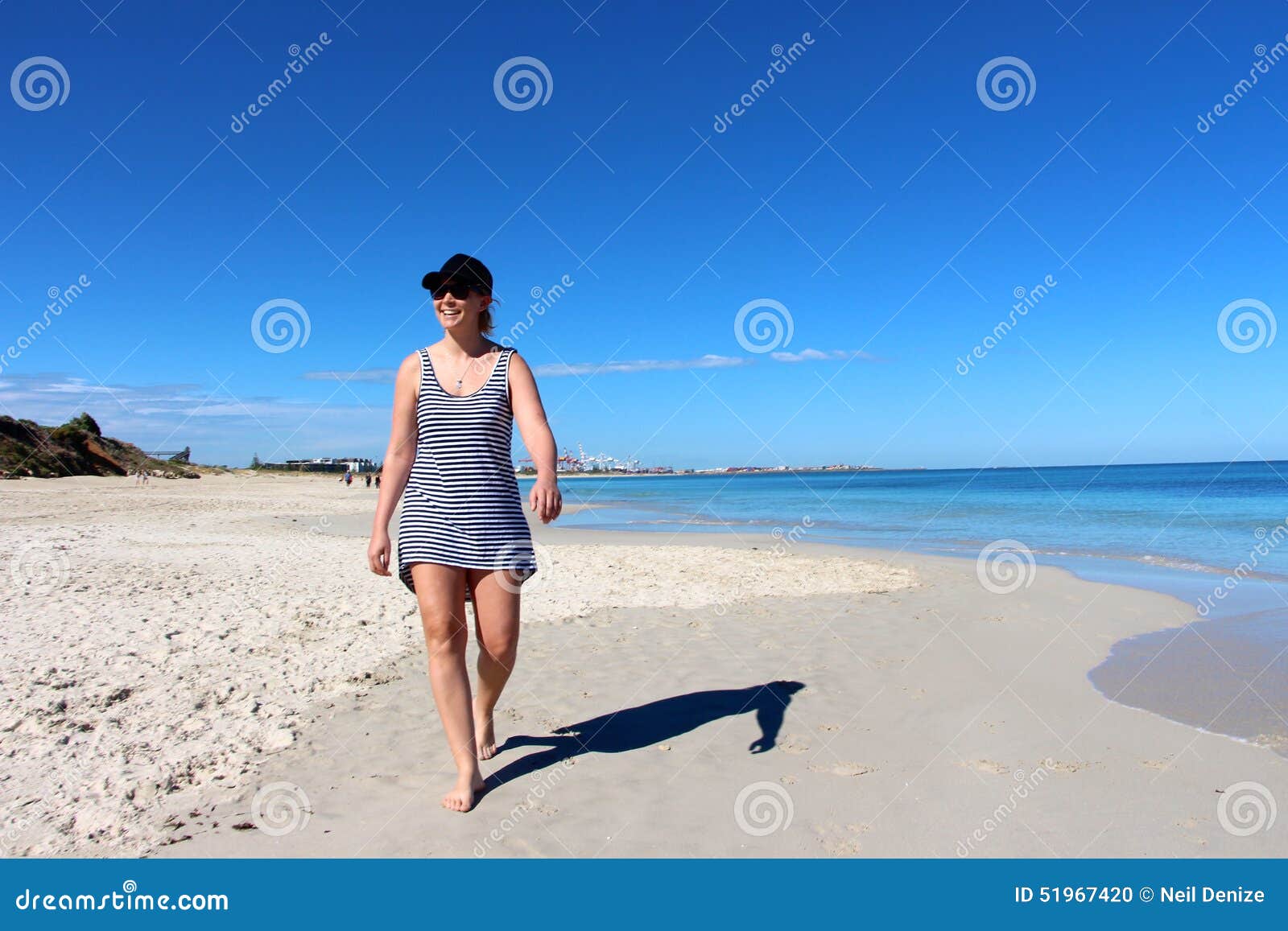 Women Taking A Morning Stroll Down Port Beach Stock Photo Image Of