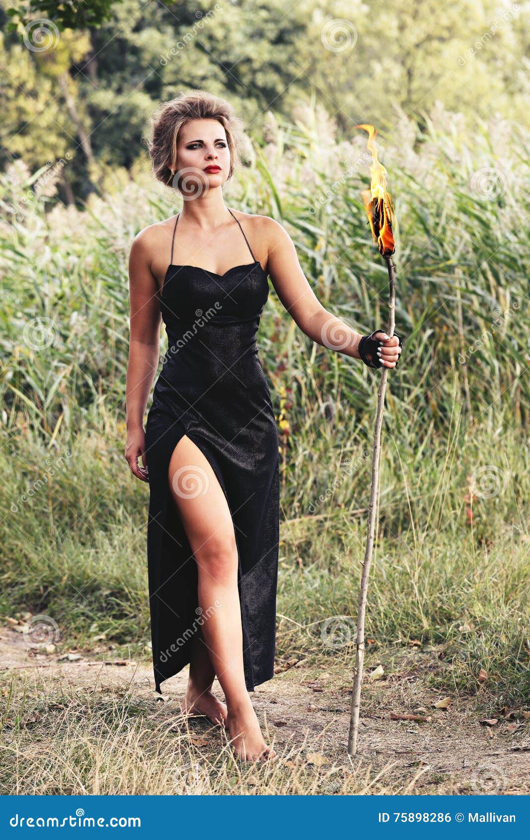 Women with with torches stock photo. Image of female 75898286