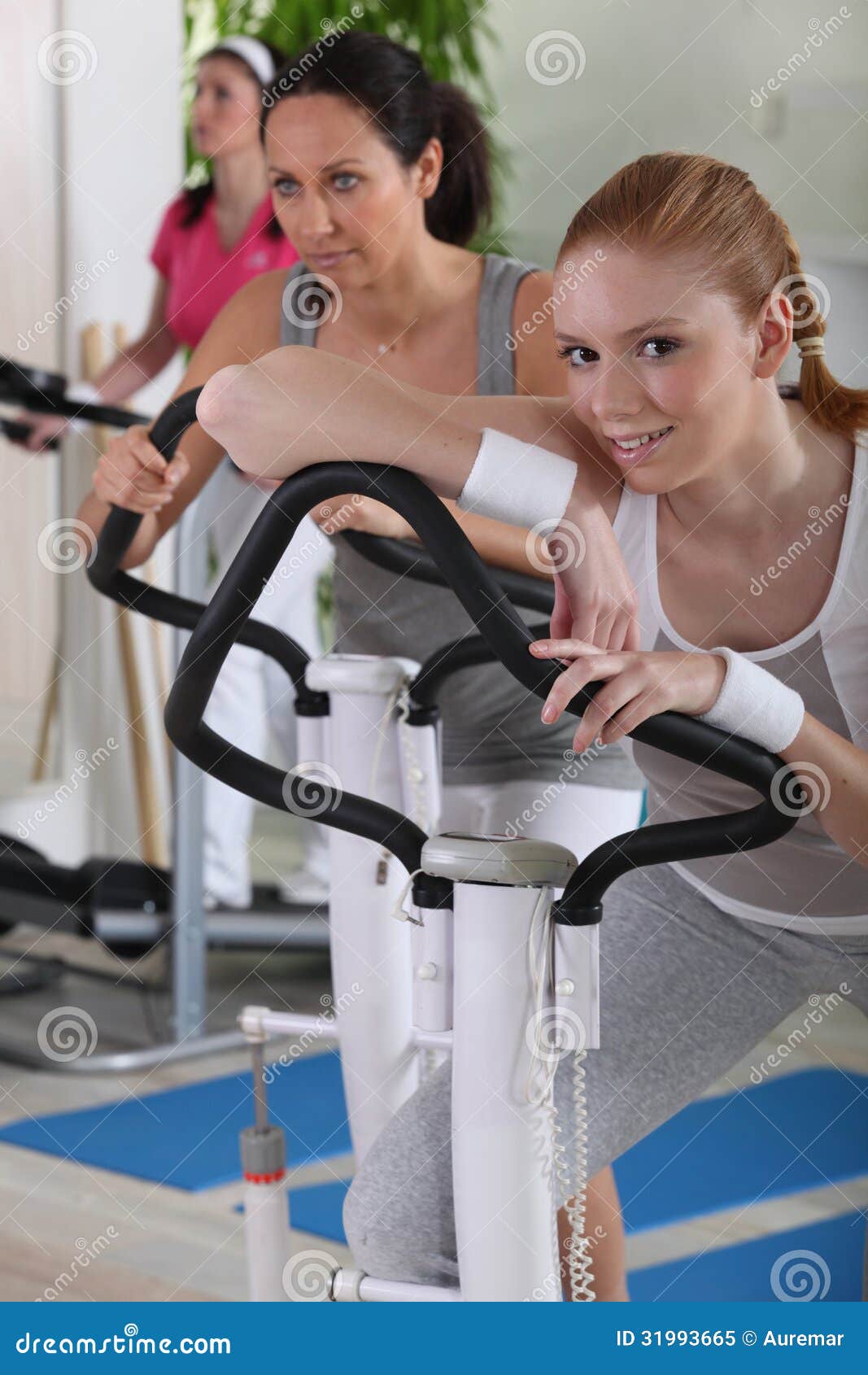 Women Using Exercise Equipment Stock Image Image of effort, beauty