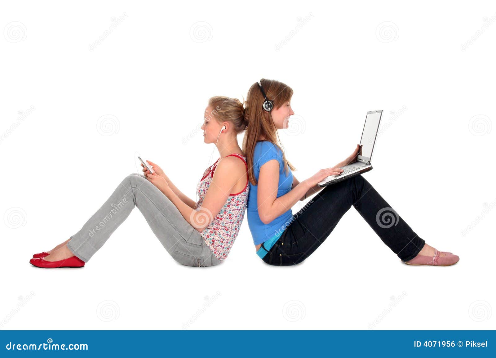 Women Using Laptop and MP3 Player Stock Photo Image of player