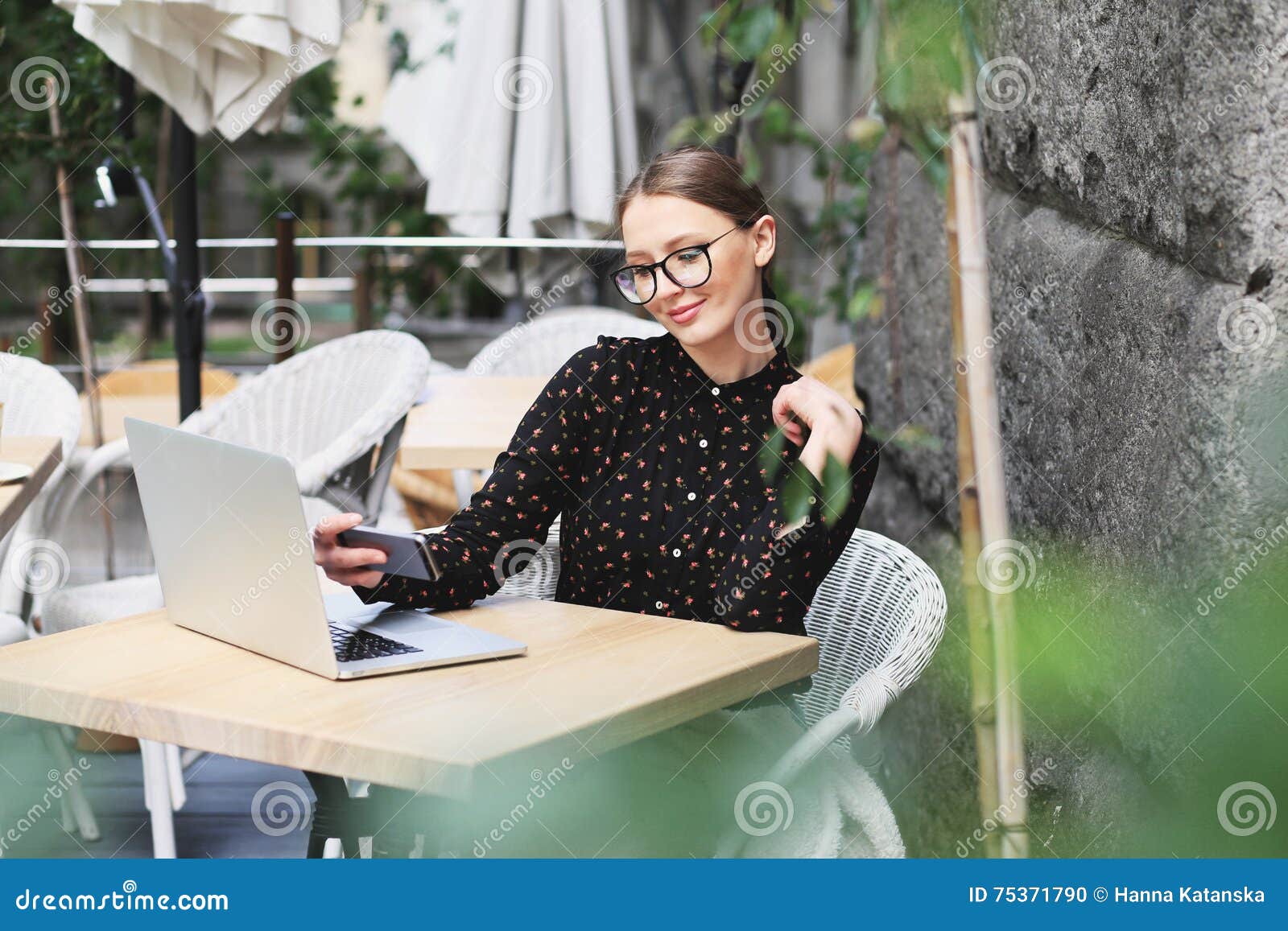 Women is Wearing Glasses and Black Shirt in the Cafe Stock Photo ...
