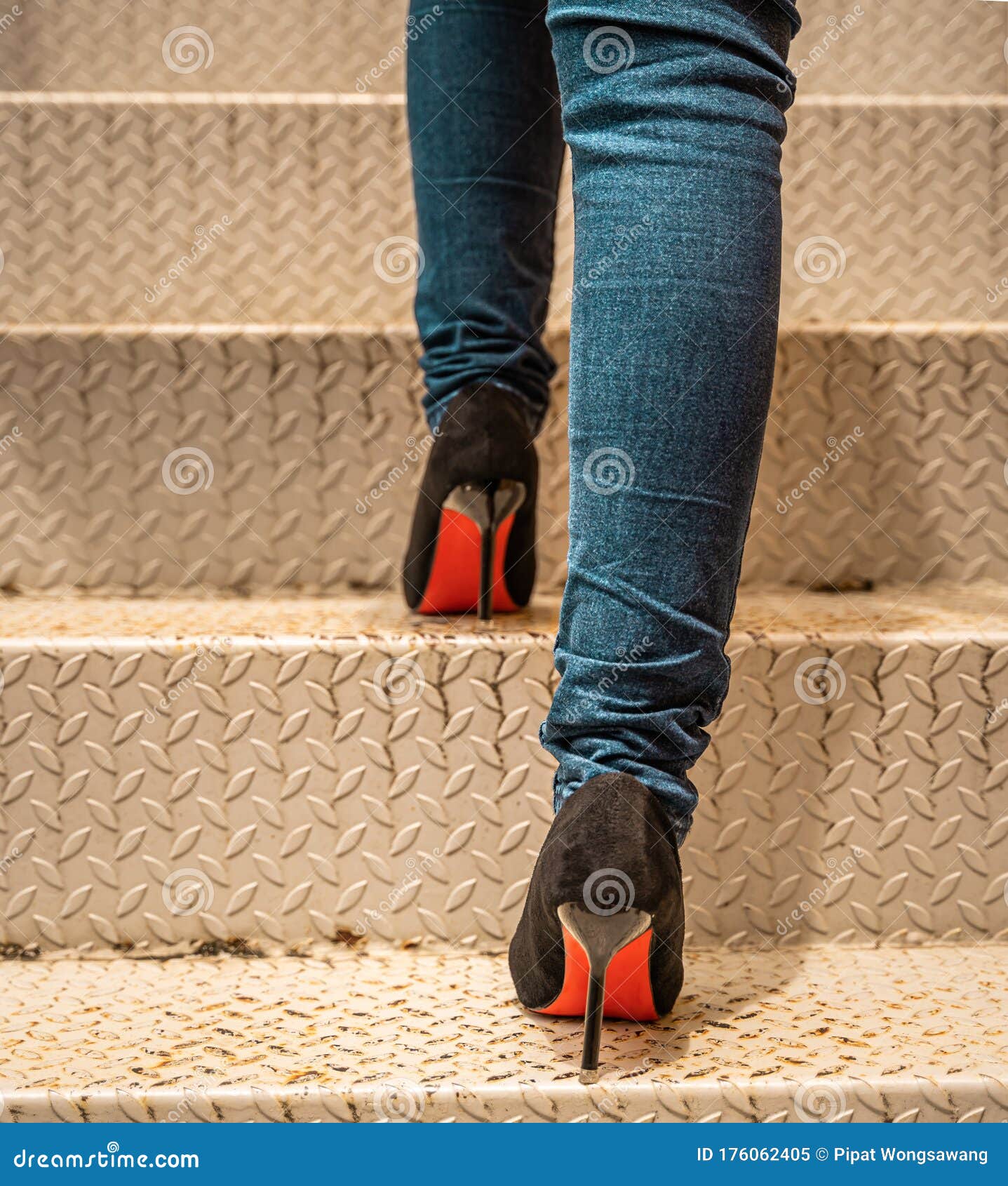 Women Wearing Jeans and Wearing High Heels are Walking Up the Stairs ...