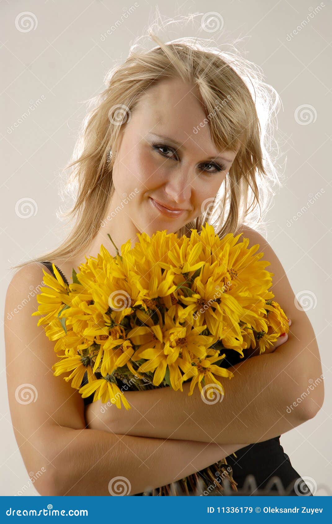 Women with yellow flowers stock image. Image of face - 11336179