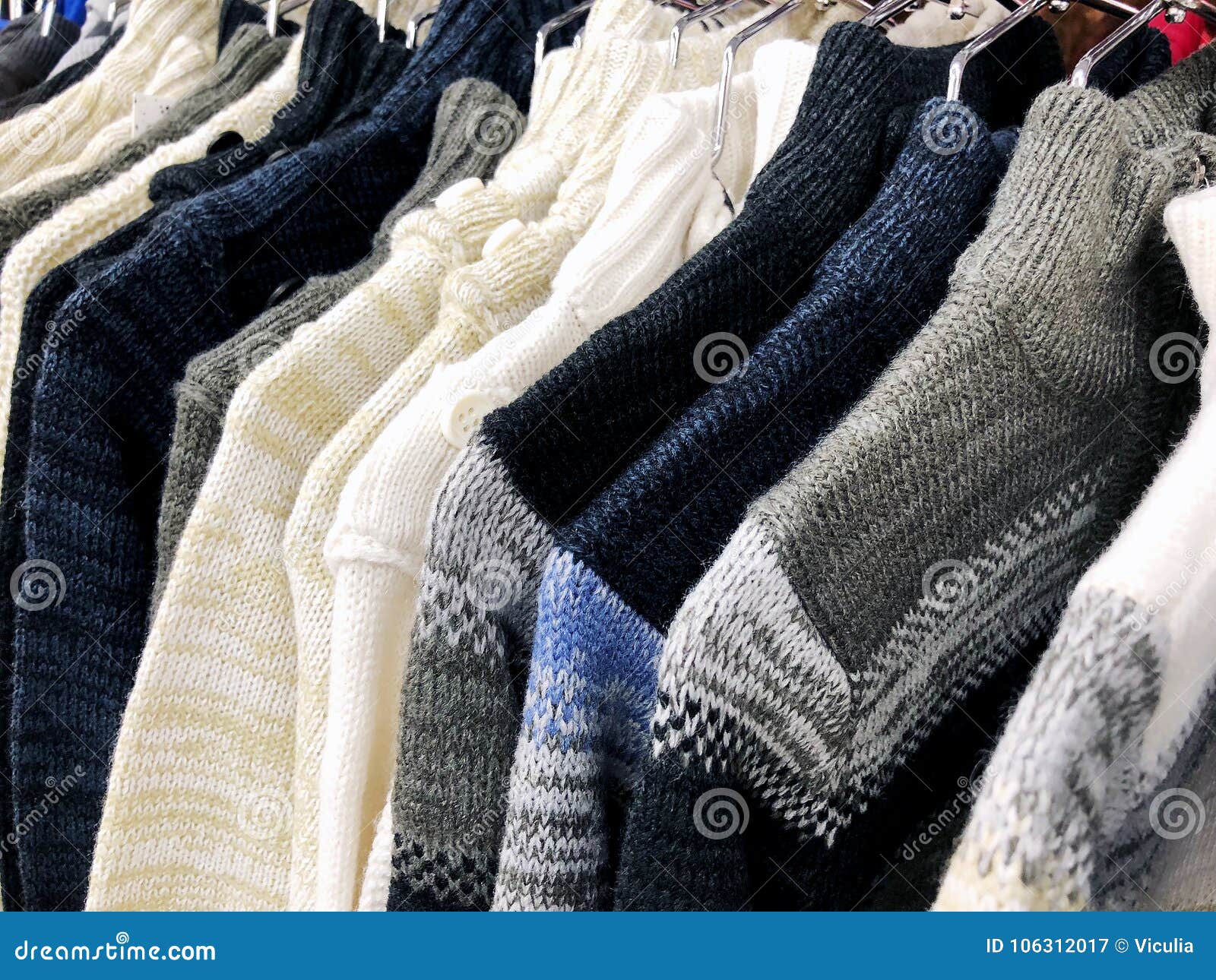 Womens Sweaters on the Hanger in the Store. Stock Image - Image of ...