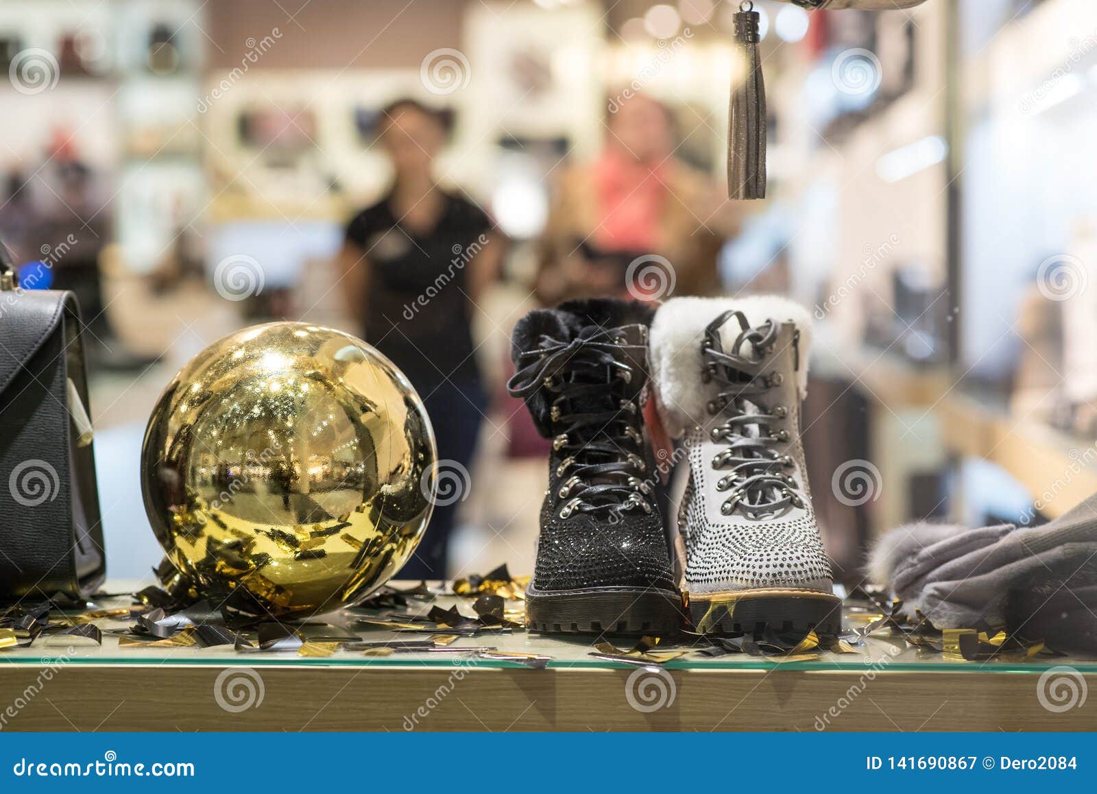 Womens Winter Boots on a Showcase in a Boutique. Fashionable and ...