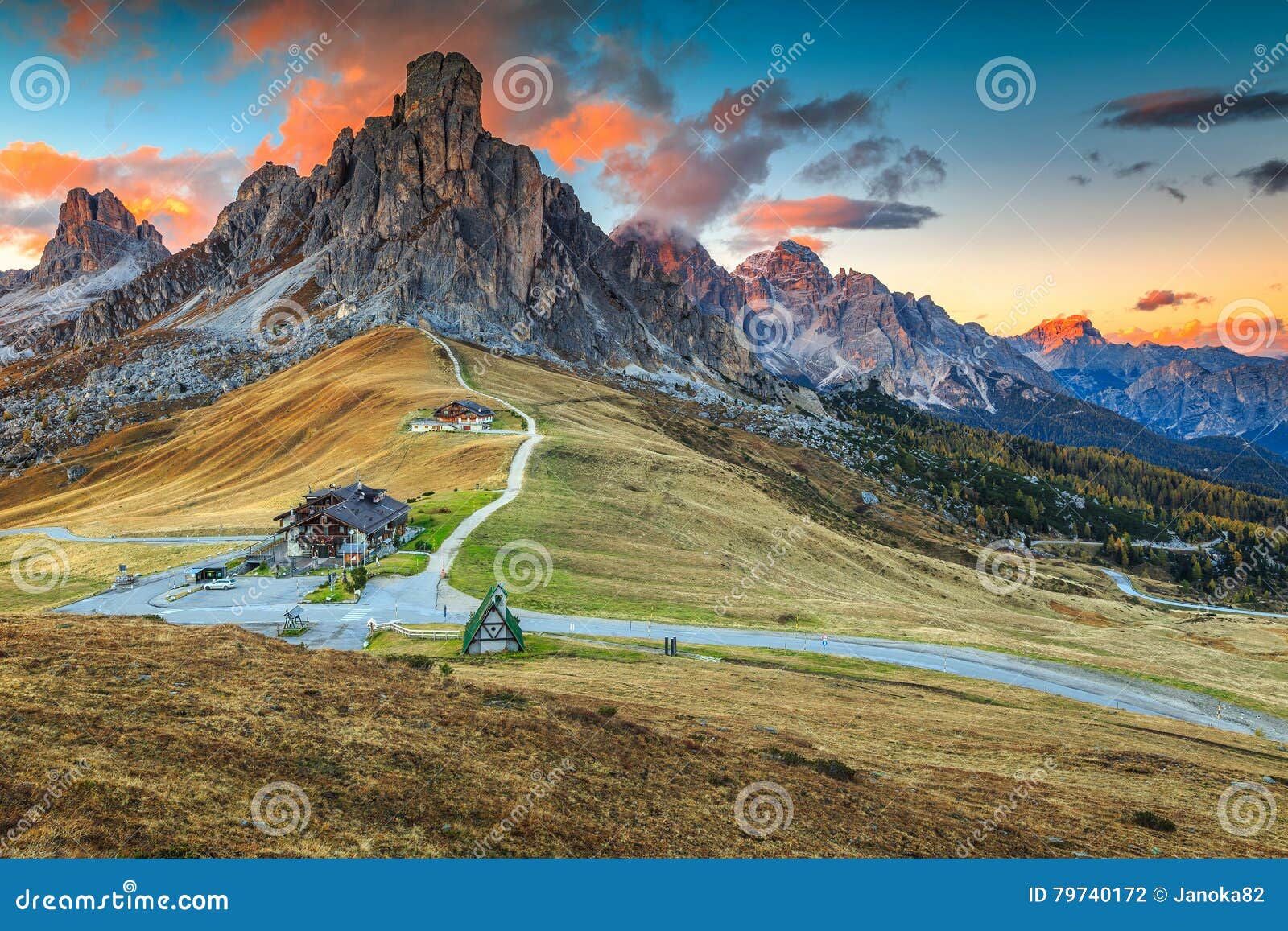 wonderful alpine pass with high peaks in background,dolomites,italy