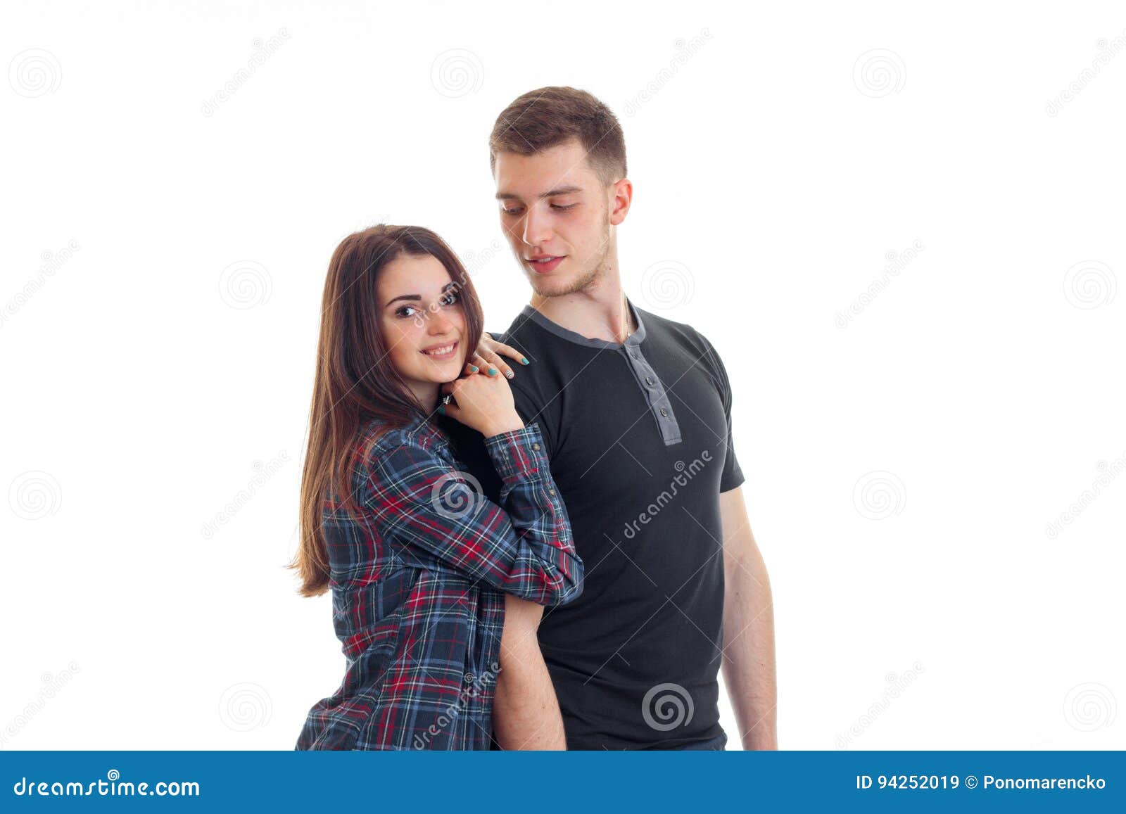 Wonderful Cute Couple Stand In The Studio And Posing For The