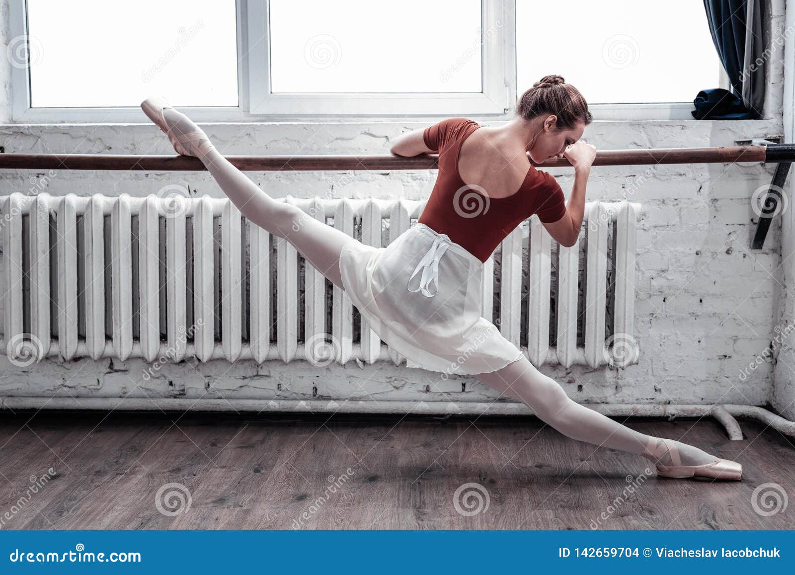 Nice Attractive Ballerina Doing The Splits In The Air