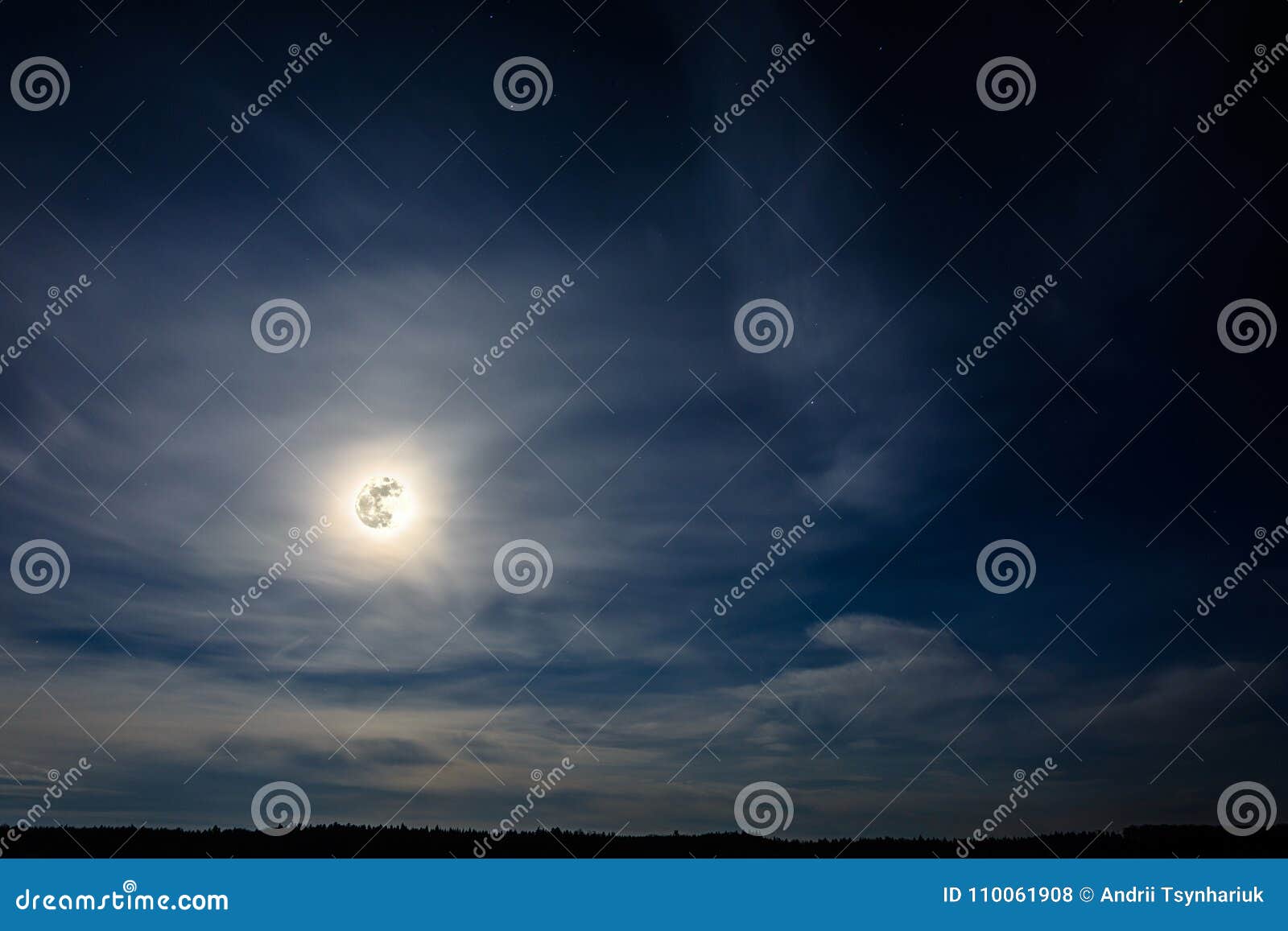A Wonderful Full Moon Has Descended Over Ukrainian Carpathians in Blurry Clouds Stock Photo
