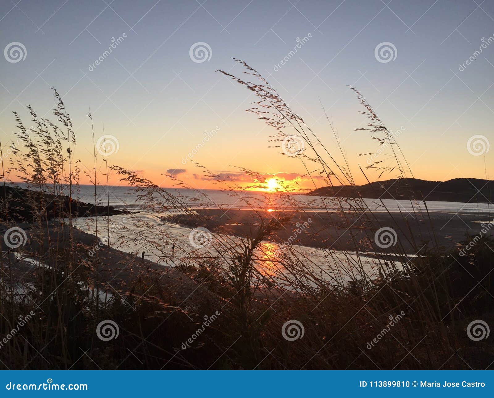 wonderful landscape of the spanish shore at sunset. hermoso atardecer en el mar.