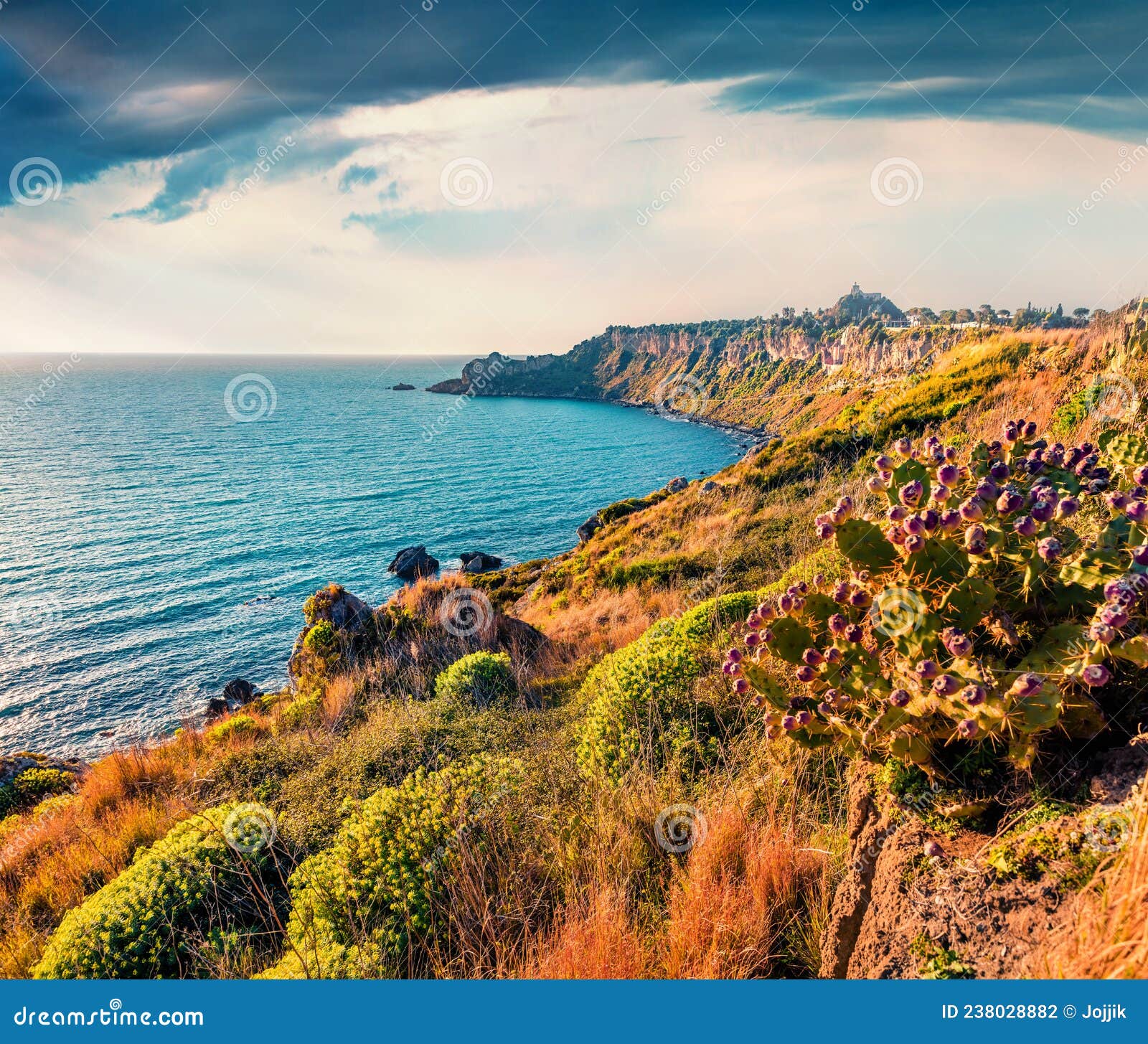 wonderful morning view of milazzo cape with nature reserve piscina di venere, sicily, italy