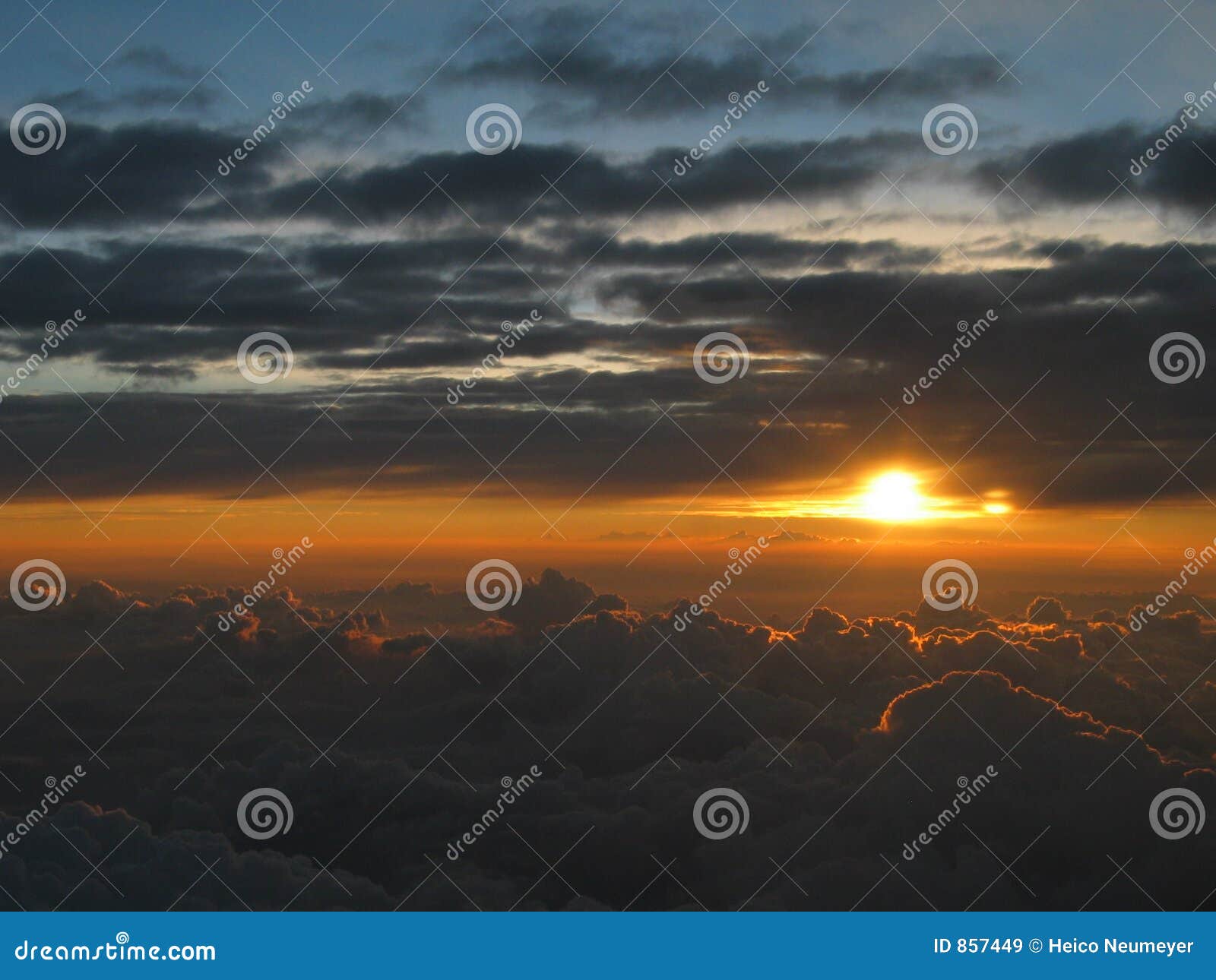 wonderful sunset above the clouds, peaceful meditative atmosphere