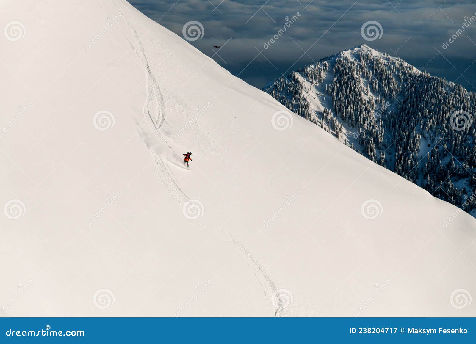 Wonderful View of Mountain Slope and Skier Sliding Down on it. Freeride  Skiing Concept Stock Image - Image of outdoor, snowy: 238204717