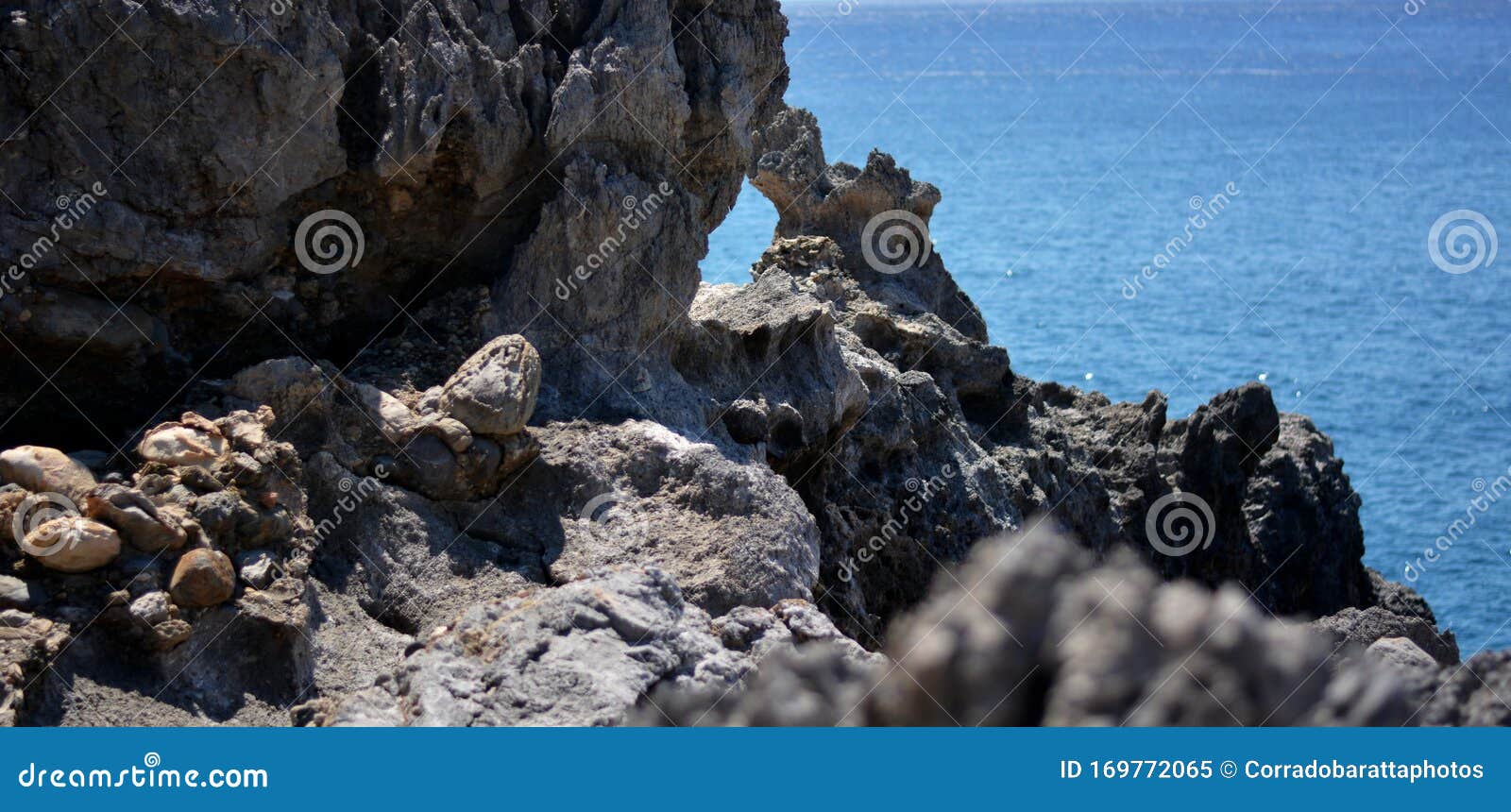 the rocks on the sea of the portuguese algarve cliff