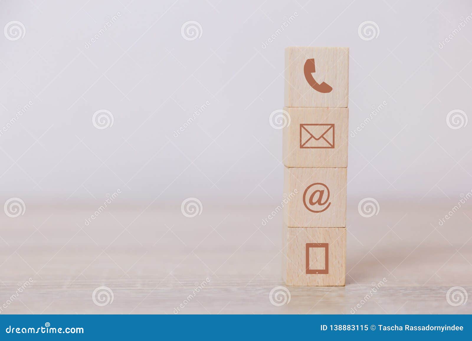 wood block  telephone, address,mail and mobile phone.the concept of communication through technology