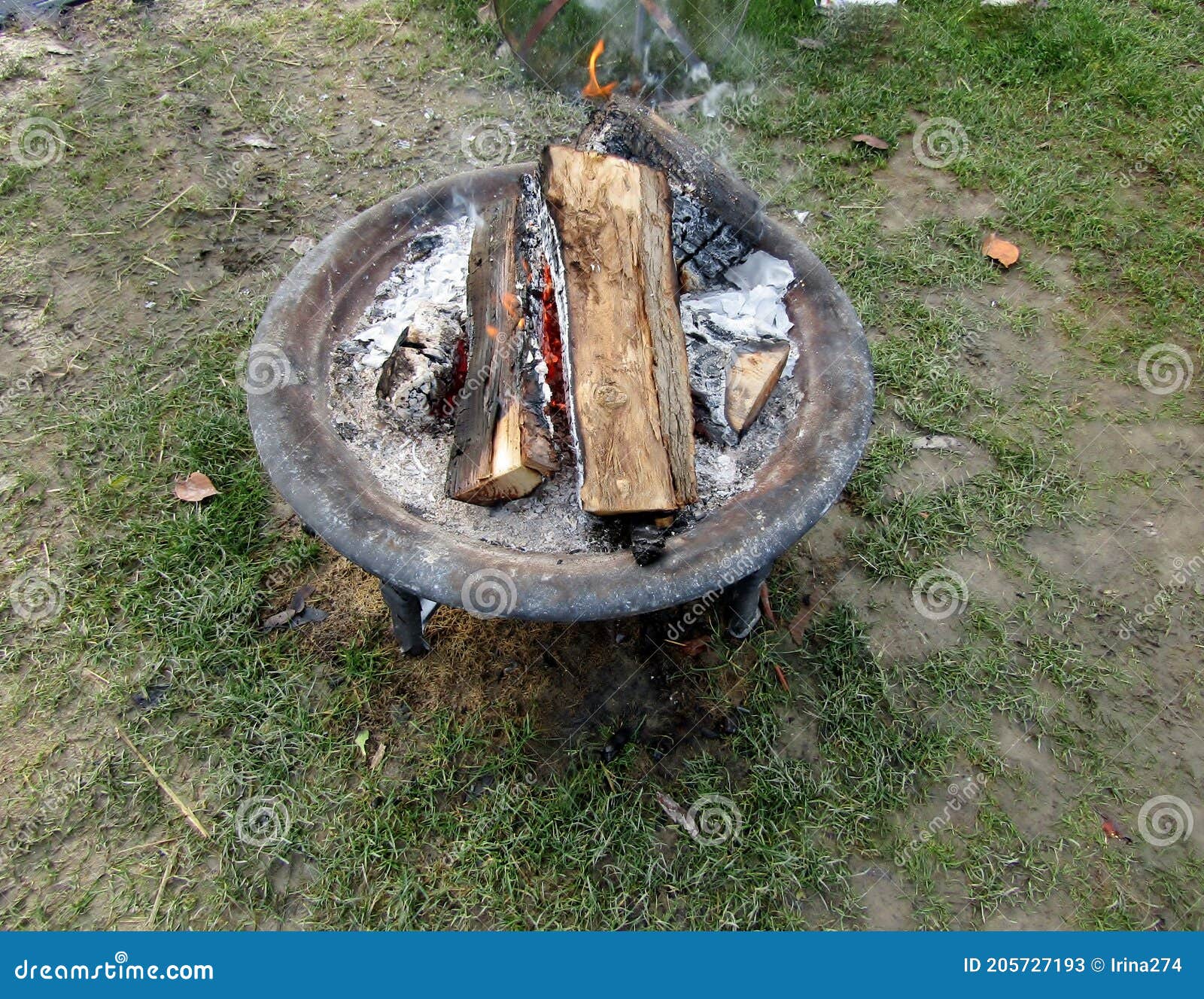 Wood burning fire pit bowl stock image. Image of flame 205727193