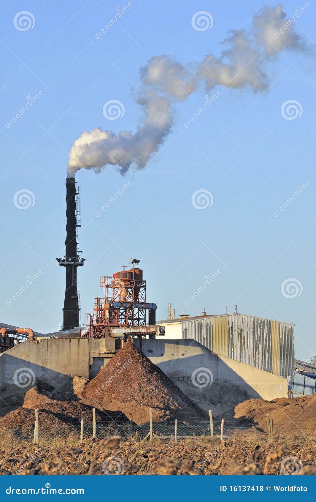 Wood chip mill stock photo. Image of plant, chimney, environmental