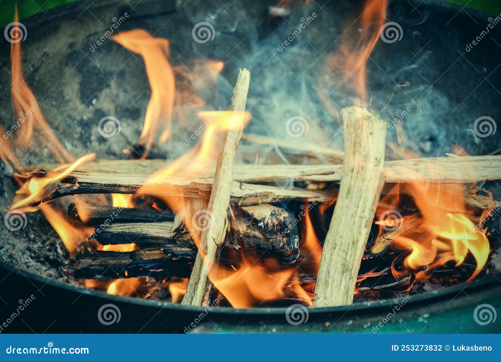 Wood Chips Burning in the Barbecue Grill in Garden Stock Photo Image