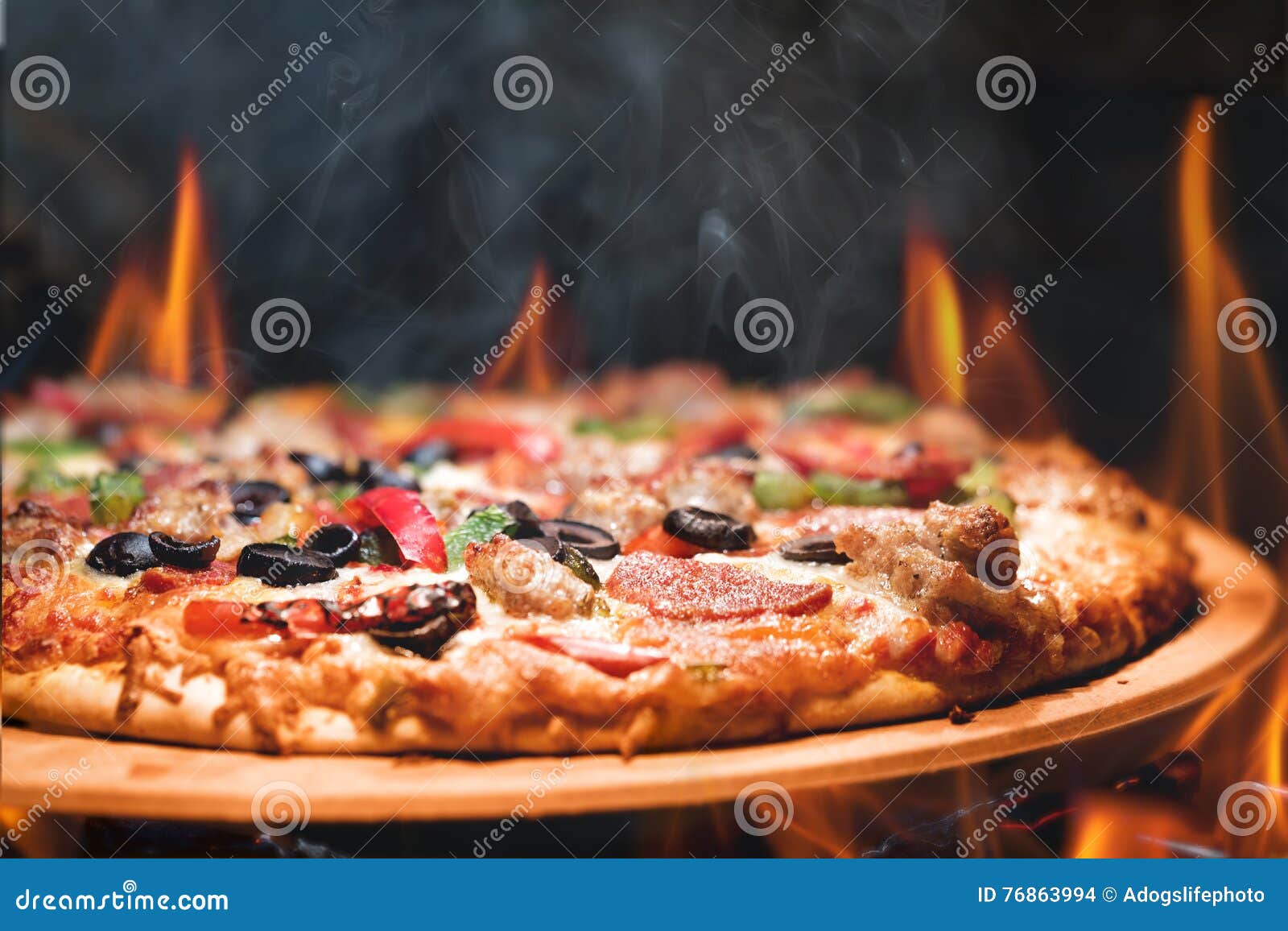 wood fired pizza with flames