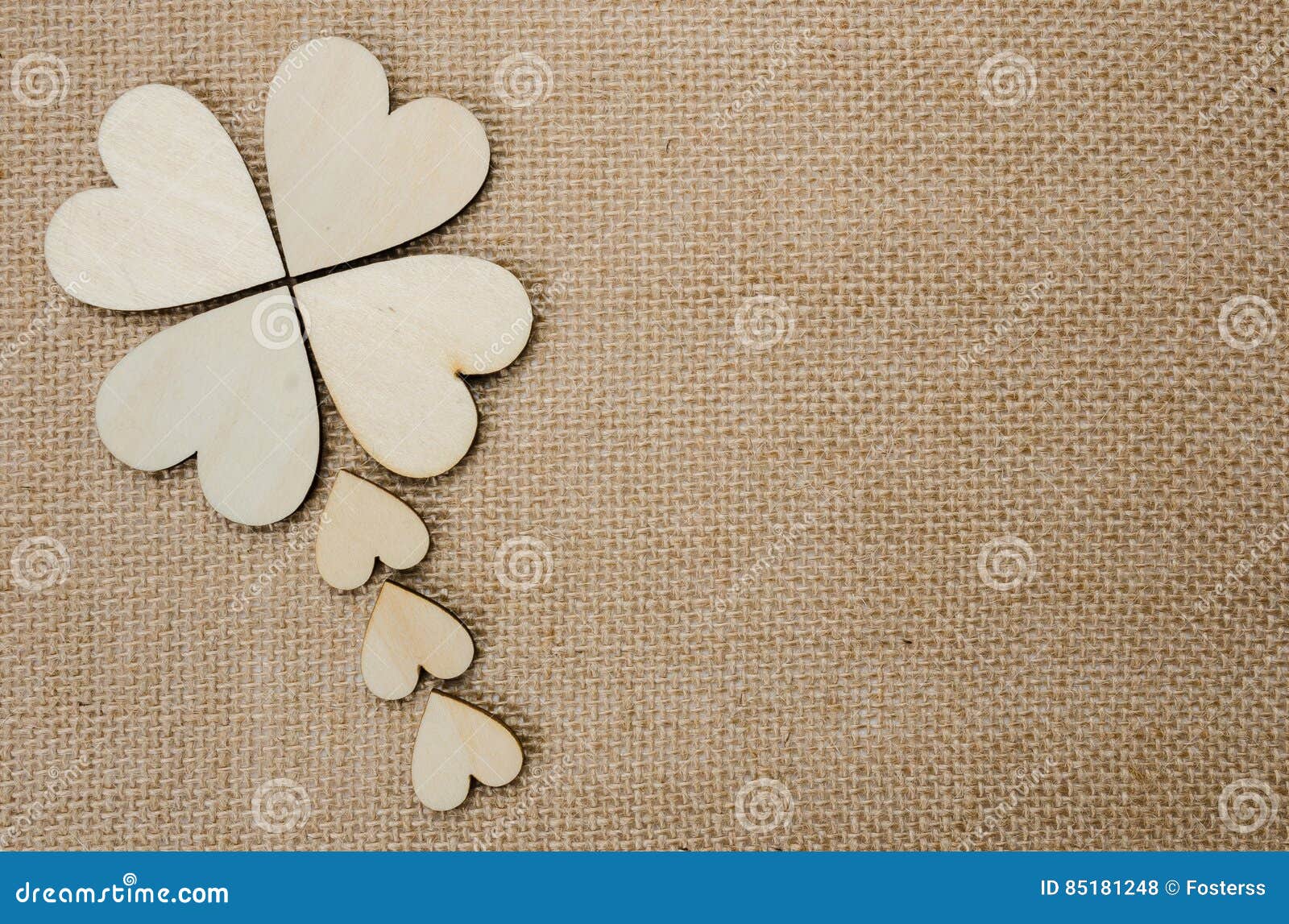 wood hearts on hessian texture background