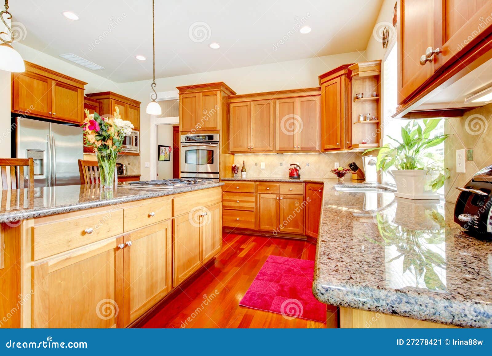 Wood Luxury Large Kitchen with Red and Granite. Stock Image Image of