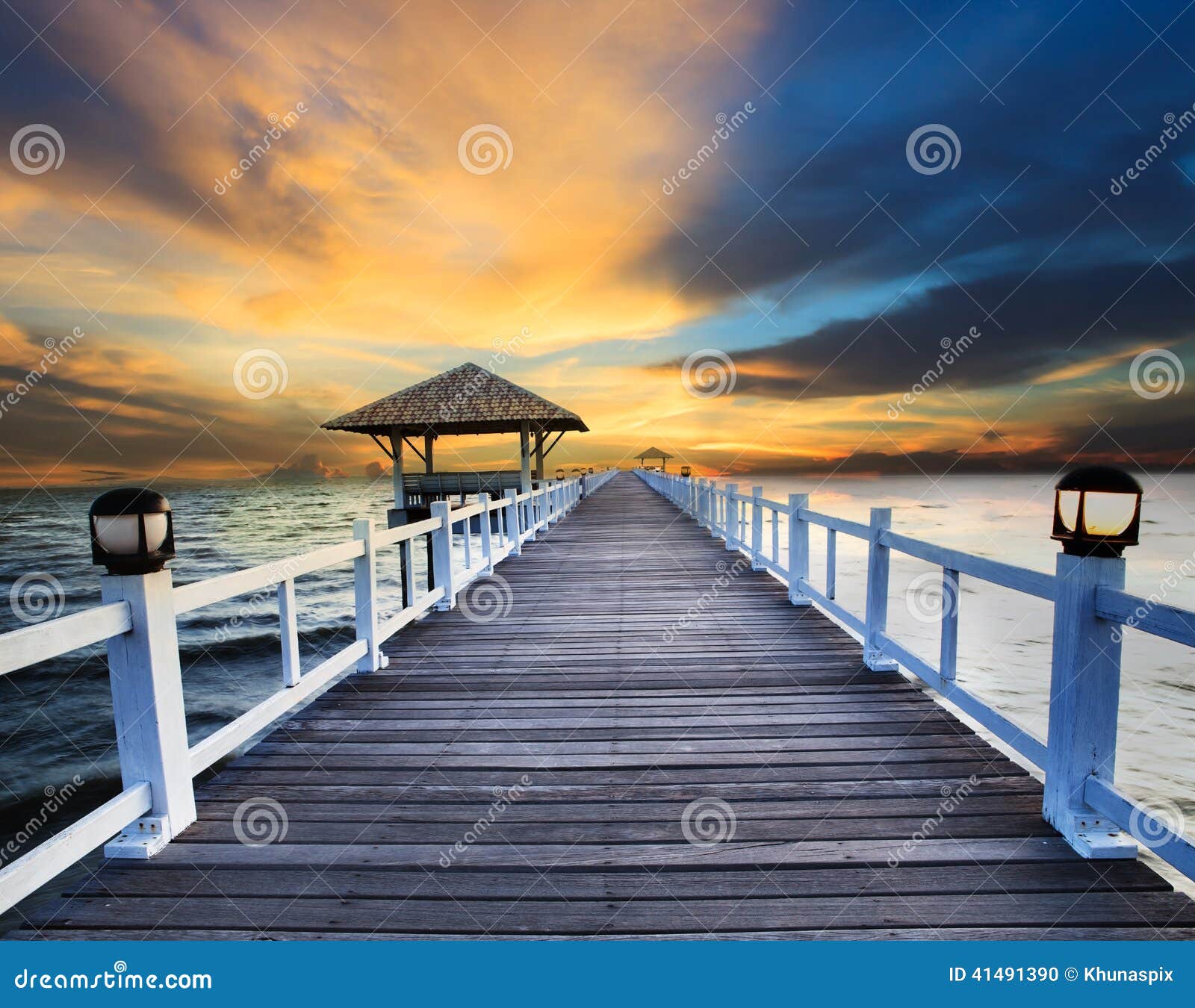 wood piers and sea scene with dusky sky use for natural background ,backdrop
