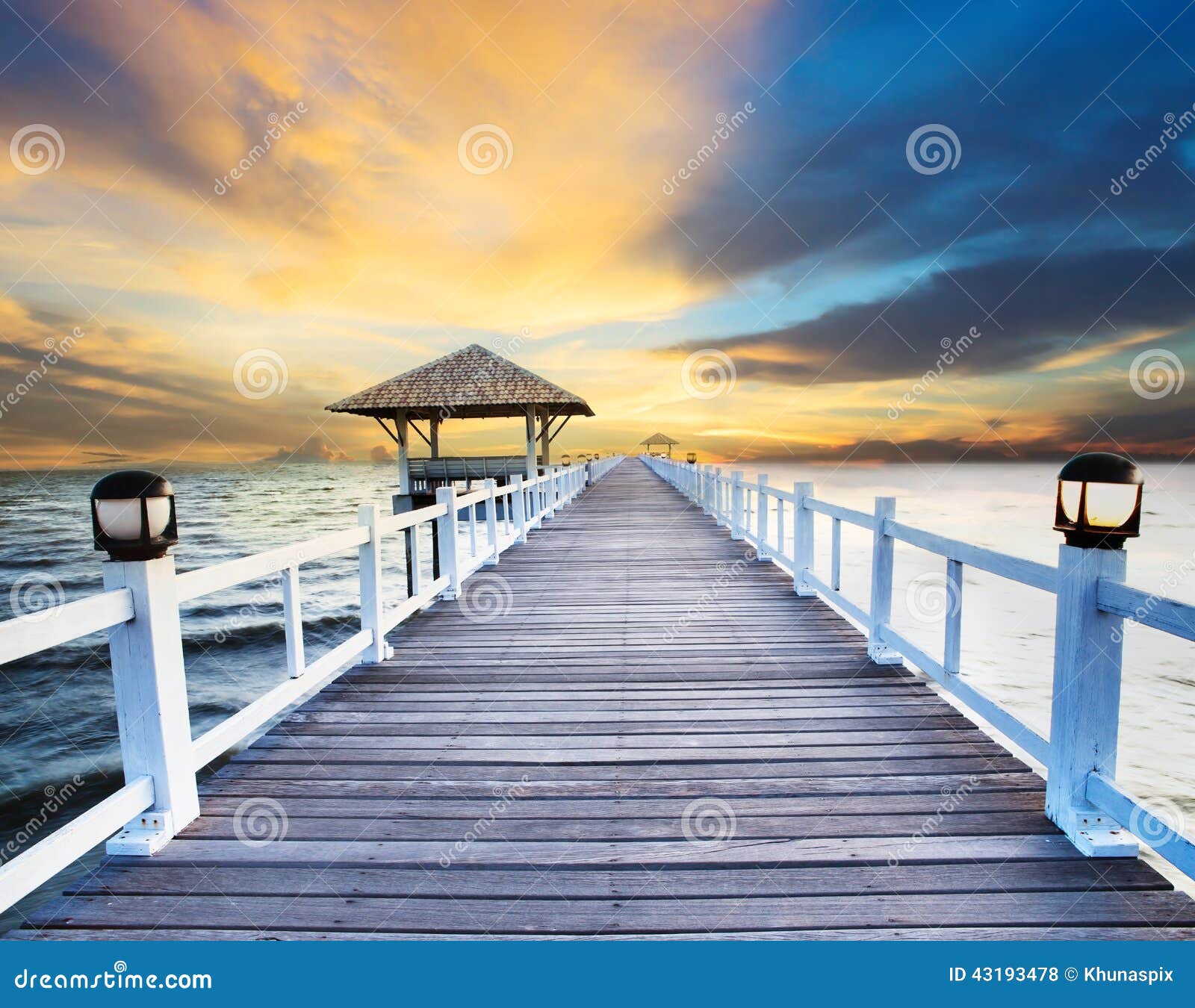 wood piers and sea scene with dusky sky use for natural background ,backdrop