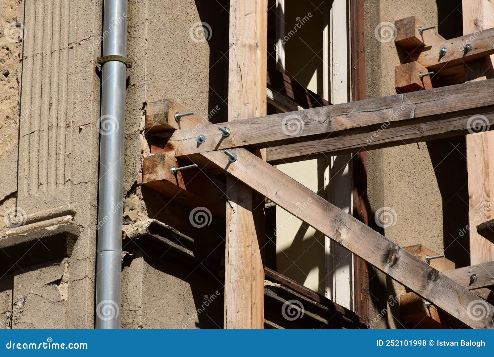wood scaffolding joint and bolted connection closeup. textured wood beams