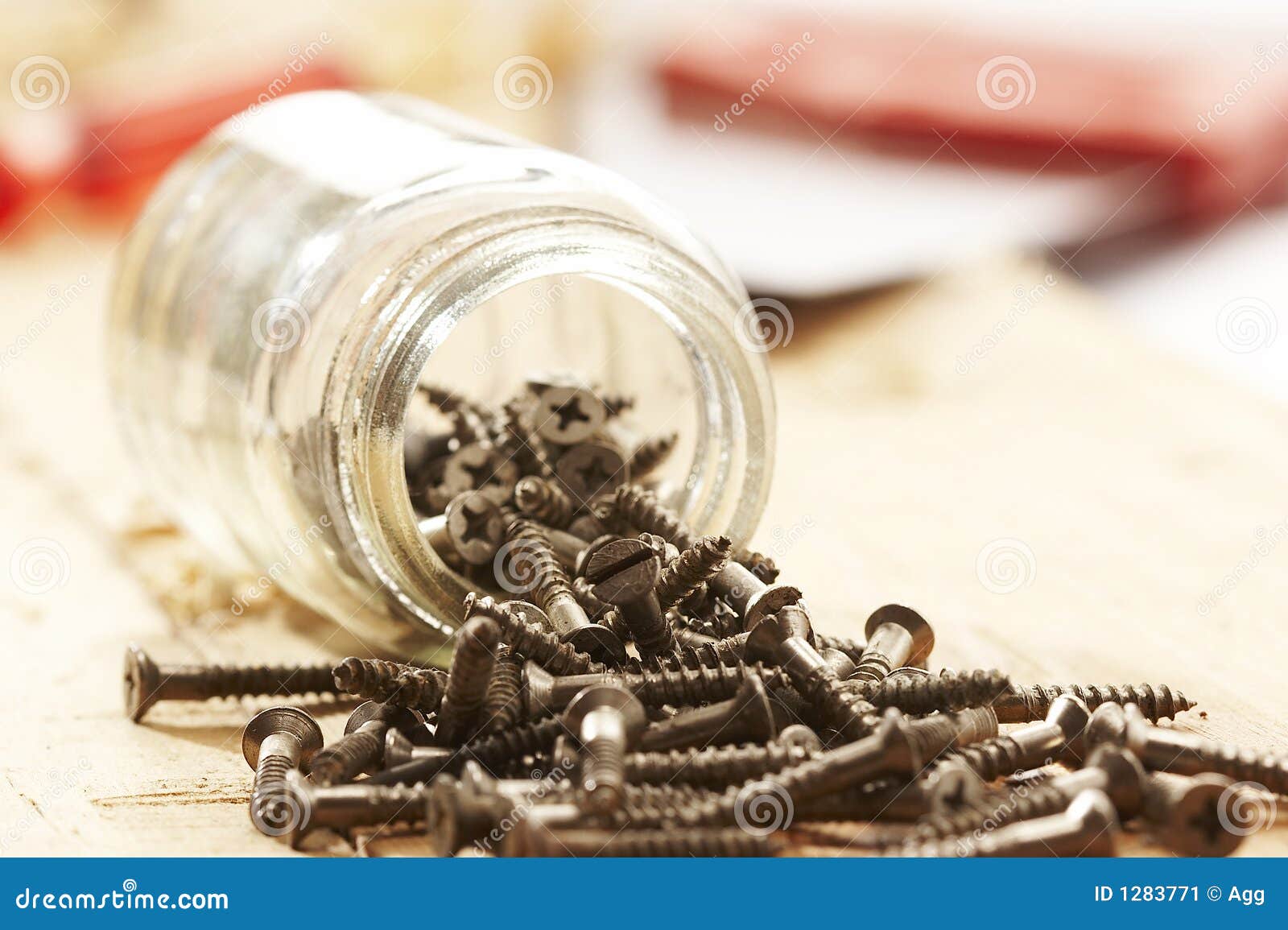 Assoretd wood on the wooden surface and overturn jar