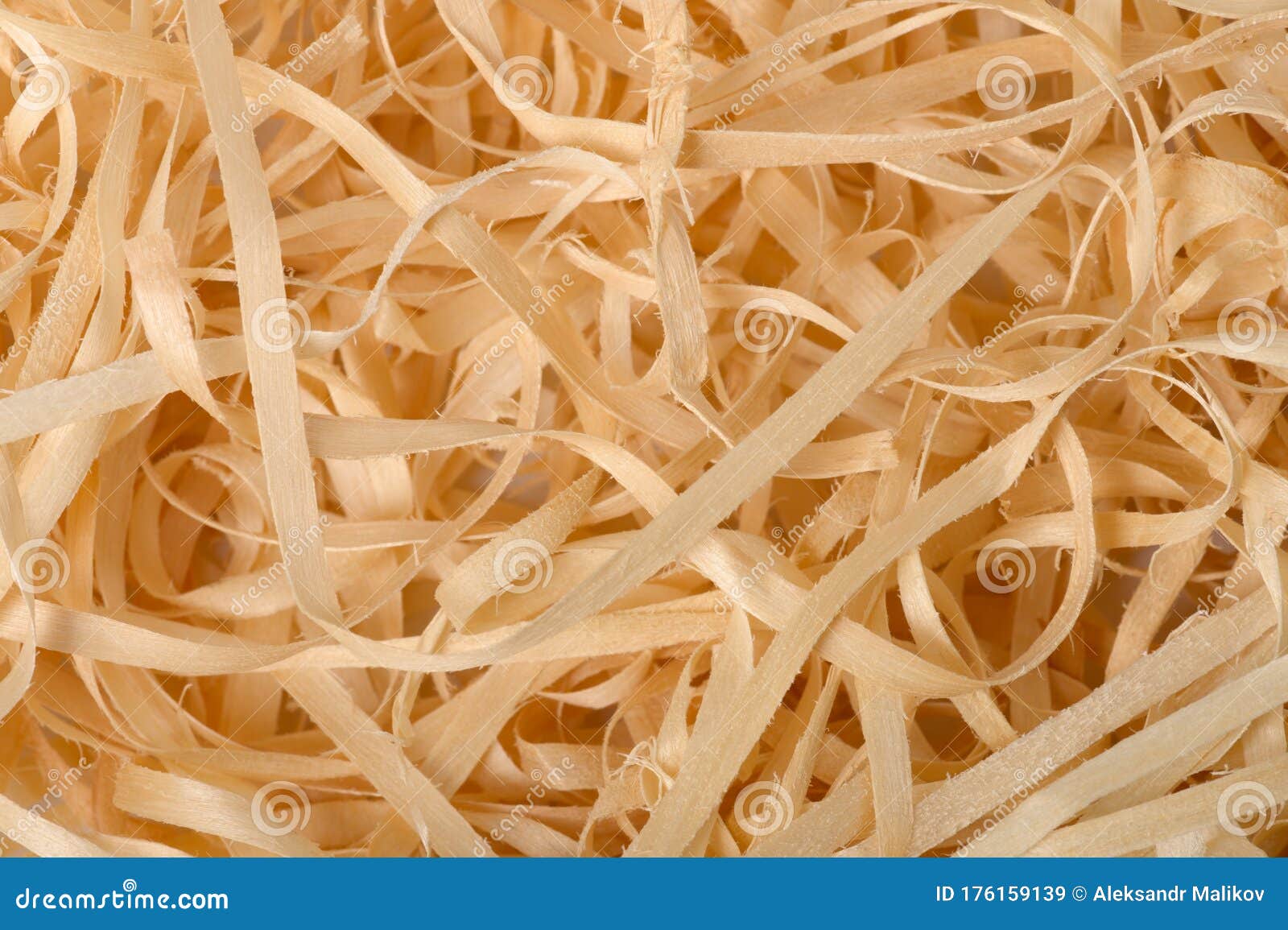 wood shavings background close-up, soft diffused light. concept of environmentally friendly packaging of fragile items