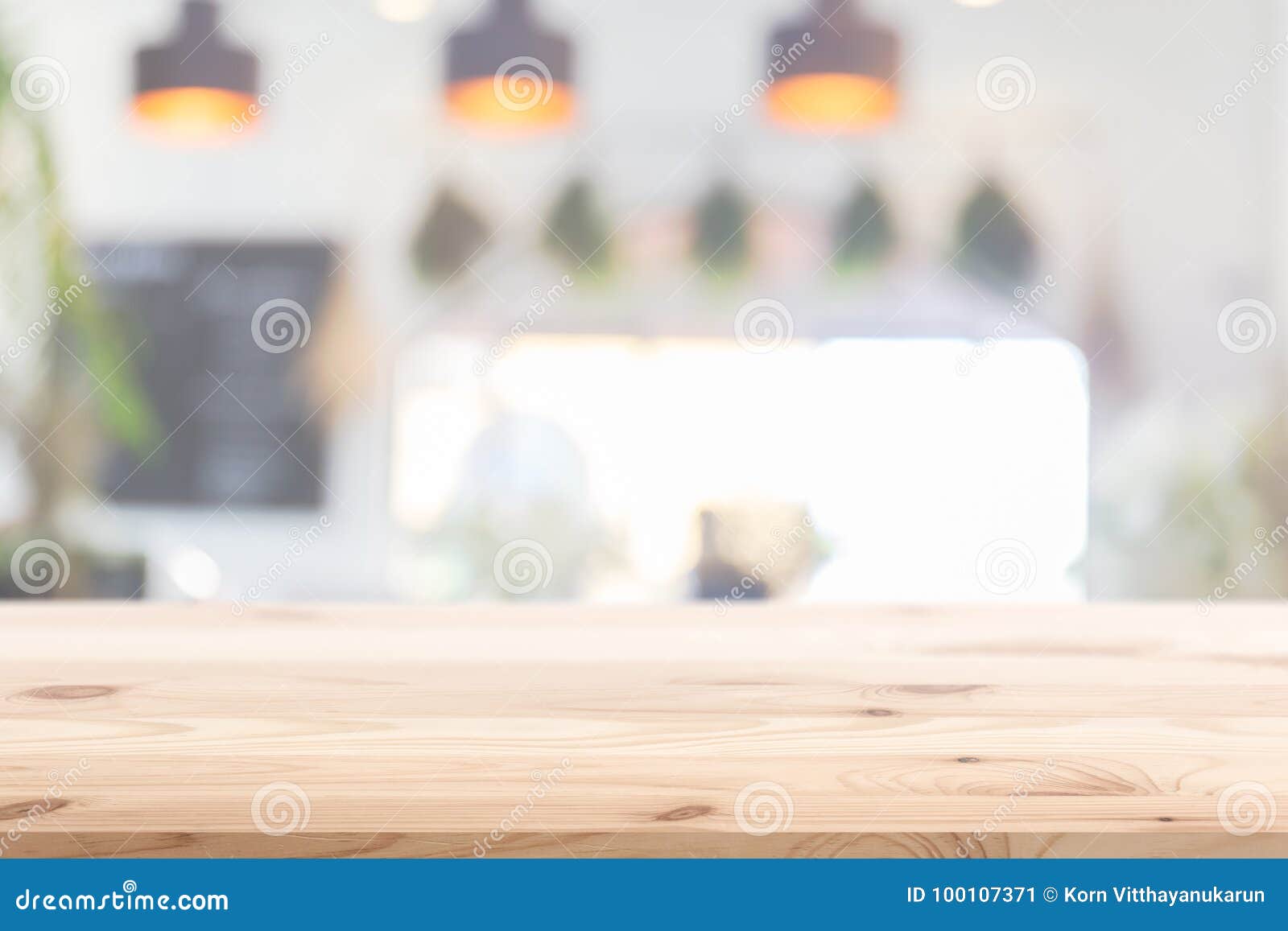 wood table foreground with blur home cafe kitchen background