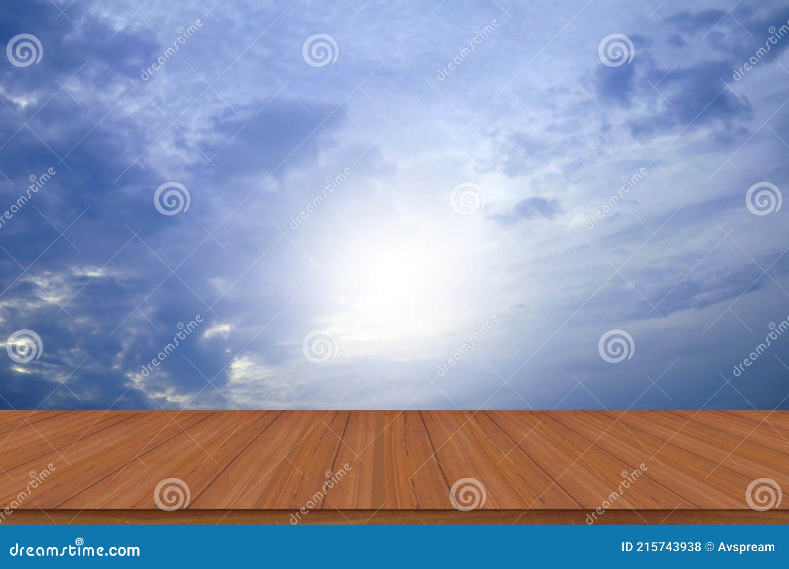 Wood Table Top in Blue Sky with Sunlight Background Stock Photo Image