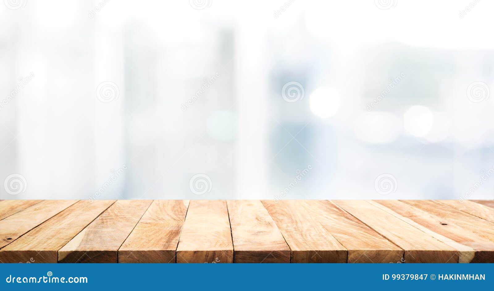 wood table top on blur glass window wall building background