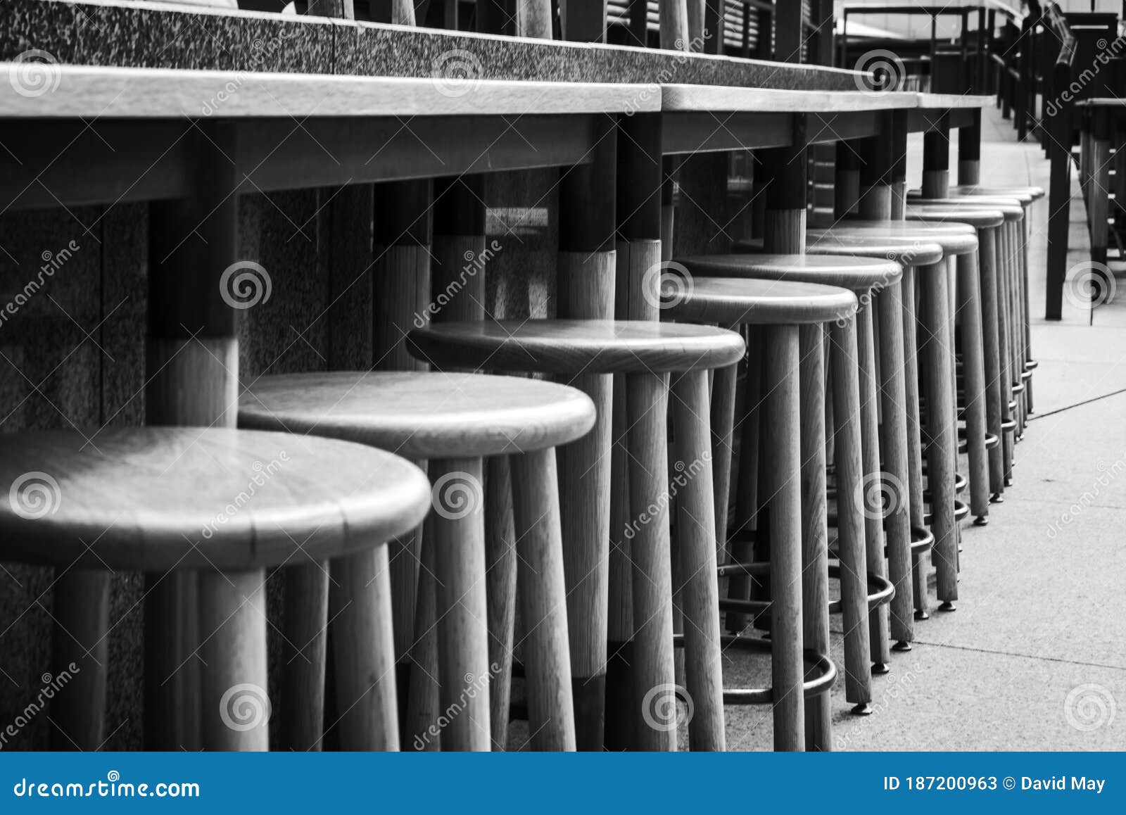 wooden bar stools mono outdoor eatery