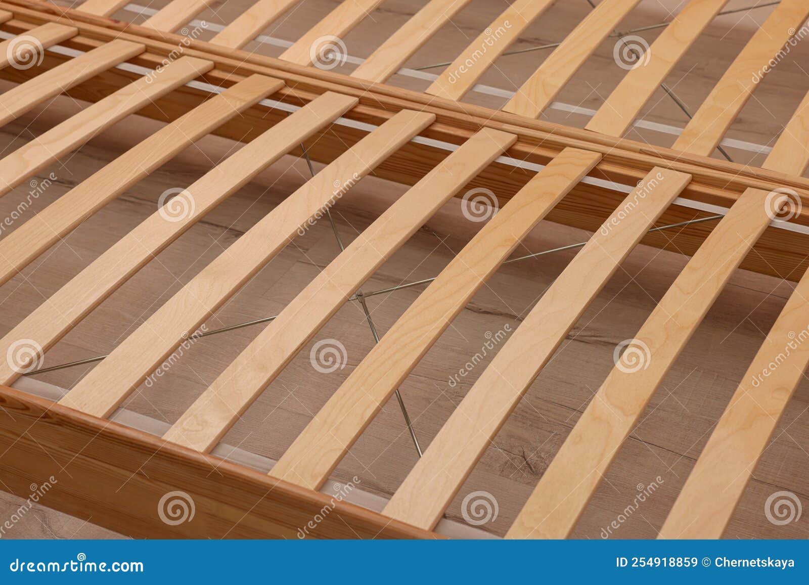 Wooden Bed Frame on Floor, Closeup Stock Image Image of cozy, bedding