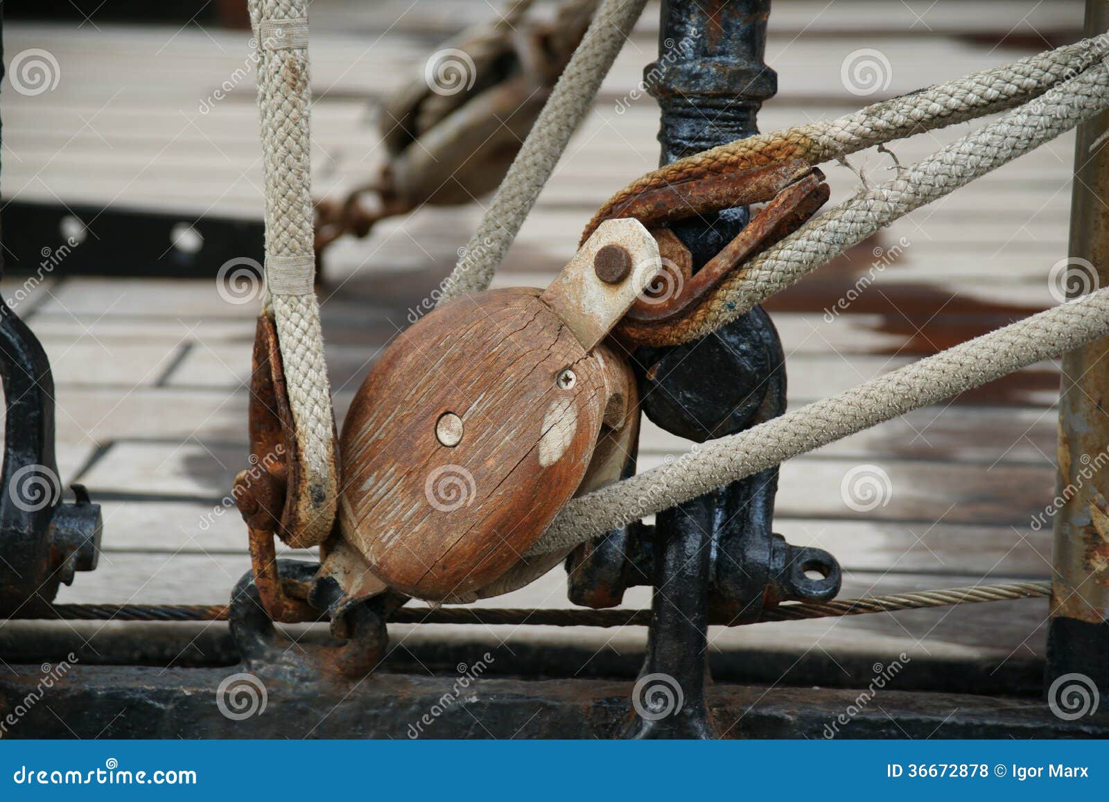 Wooden block with rope stock photo. Image of leisure 36672878