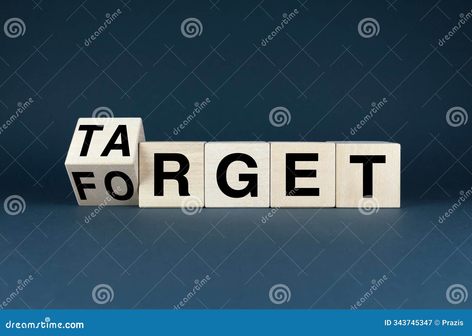 wooden blocks spelling out target and forget