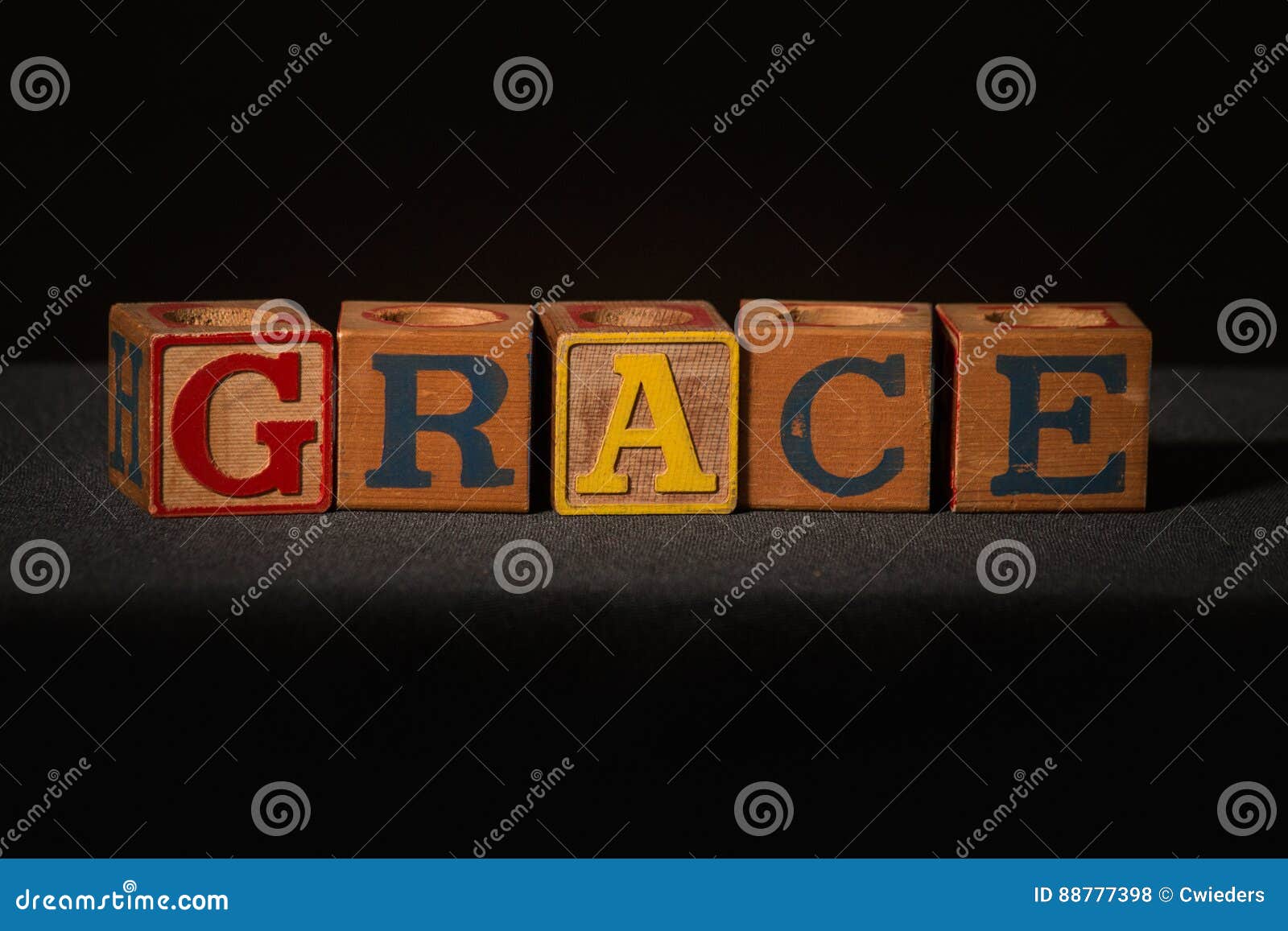 wooden blocks spelling out the word grace
