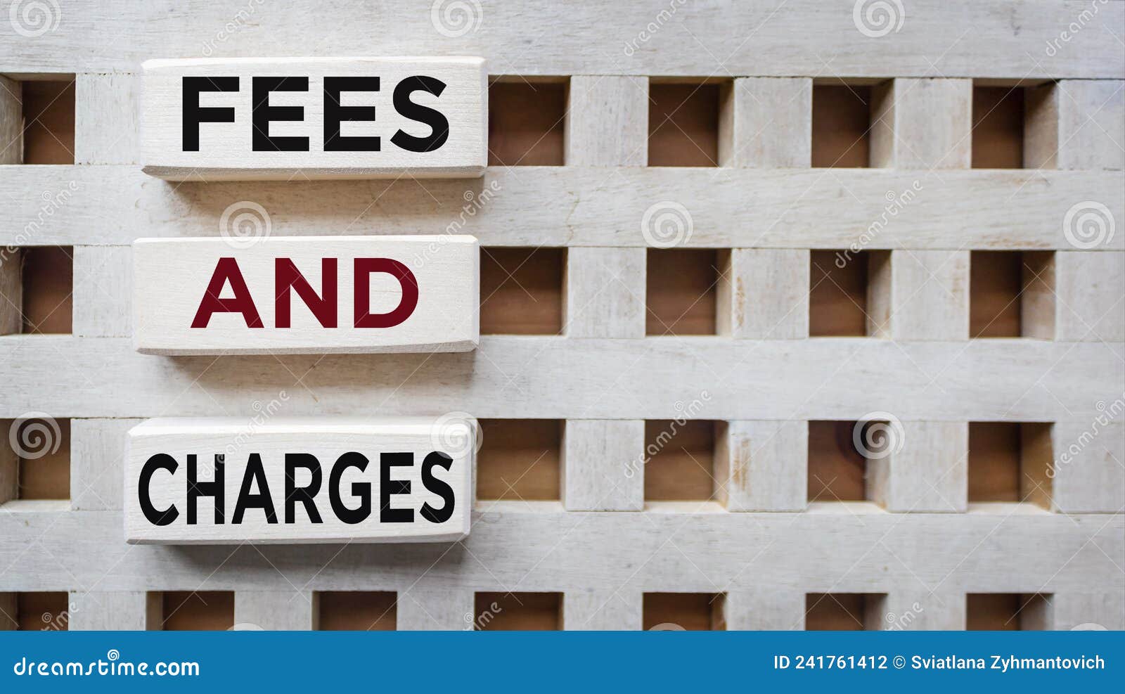 wooden blocks with text fees and charges