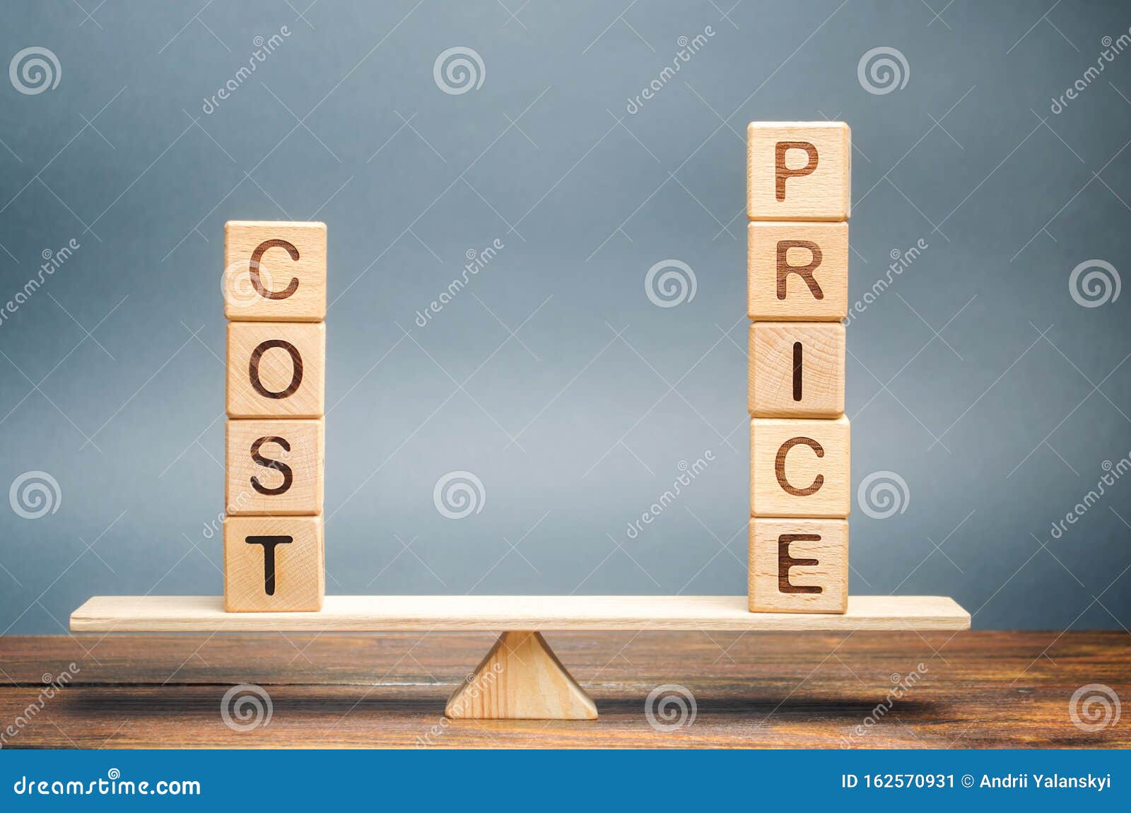 wooden blocks with the word cost and price on the scales. the concept of equivalence. optimal price. a fair deal. evaluation of