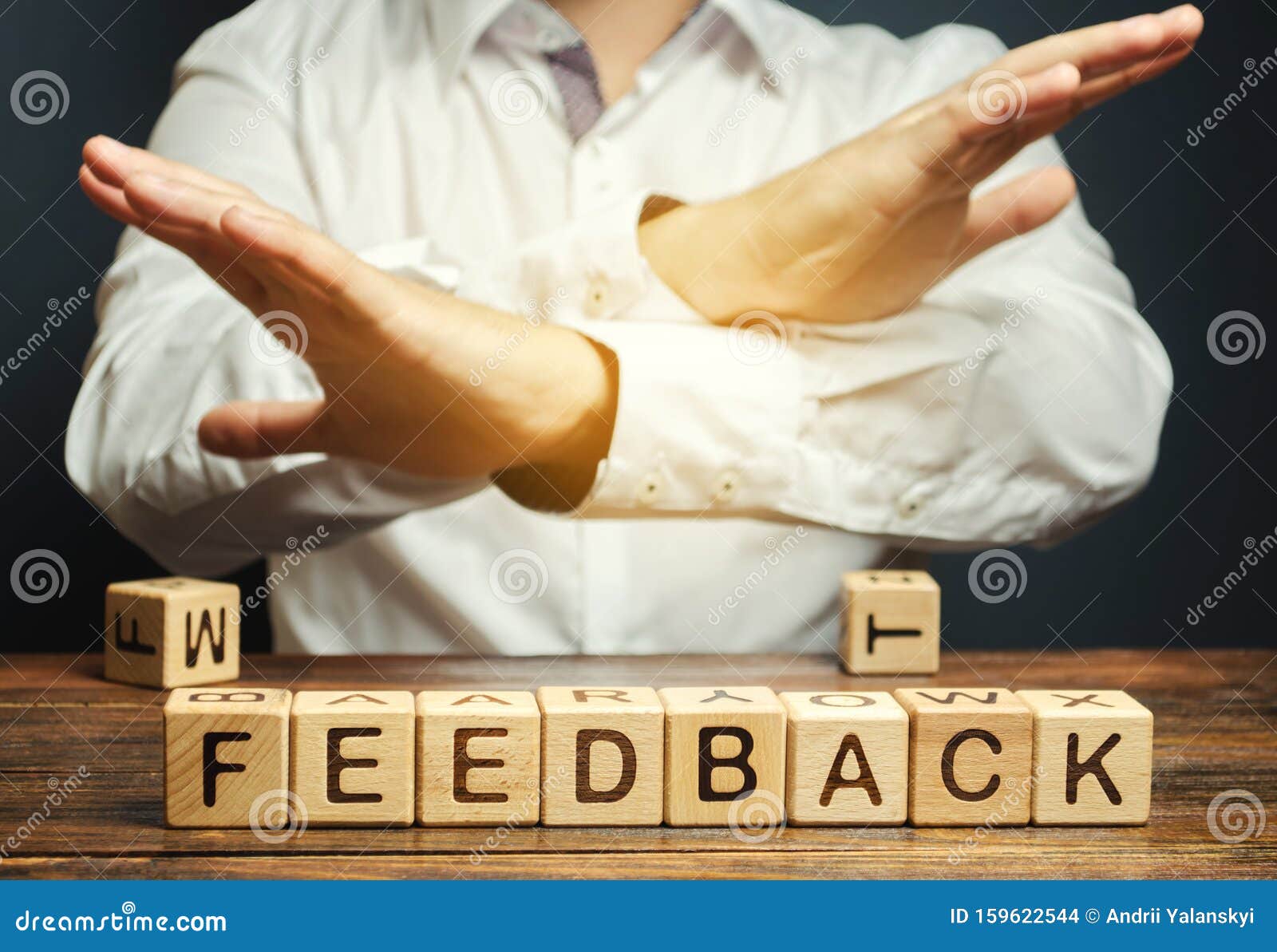 wooden blocks with the word feedback and critic. the concept of the bad rating of hotels and restaurants. the evaluation of