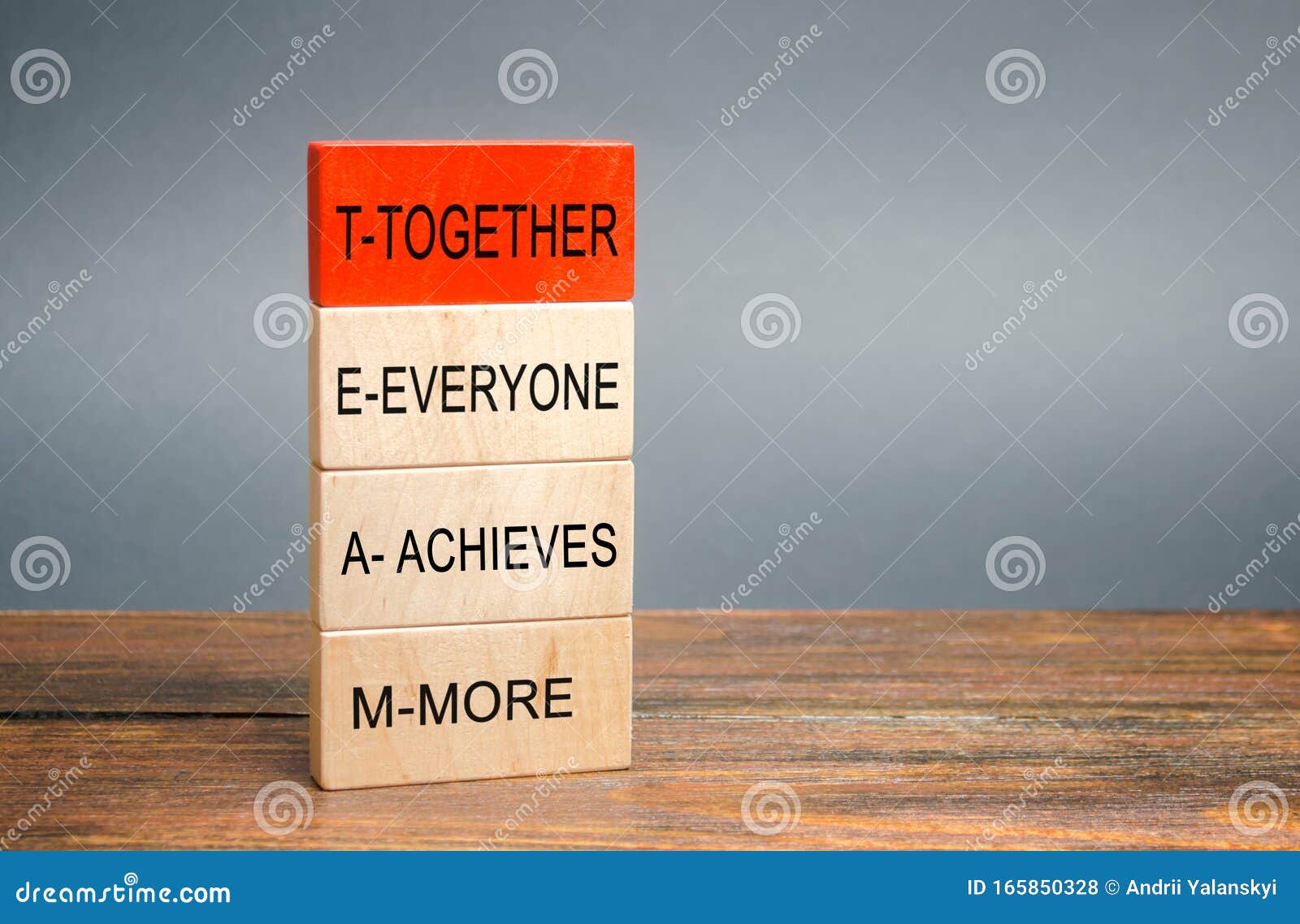 wooden blocks with the word together, everyone, achieves, more. teamwork and team concept. community, support, partnership.
