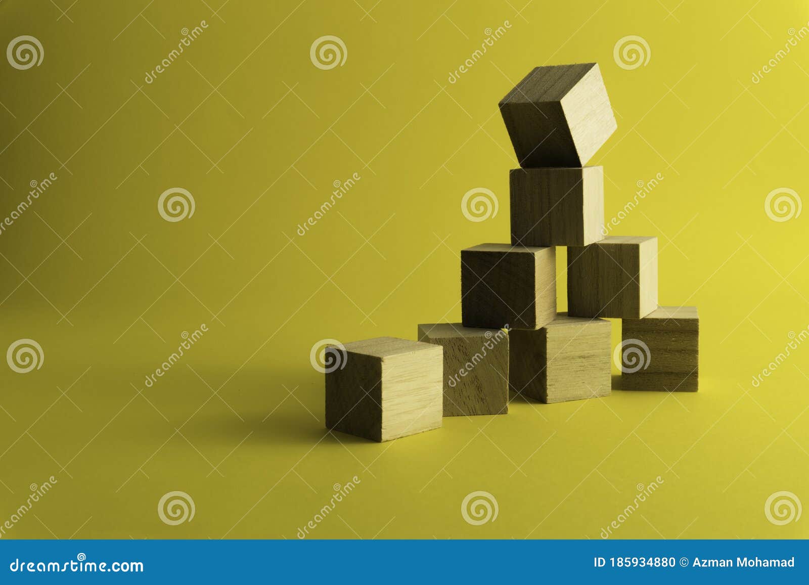 Wooden Blocks on a Yellow Background. Stock Photo Image of element