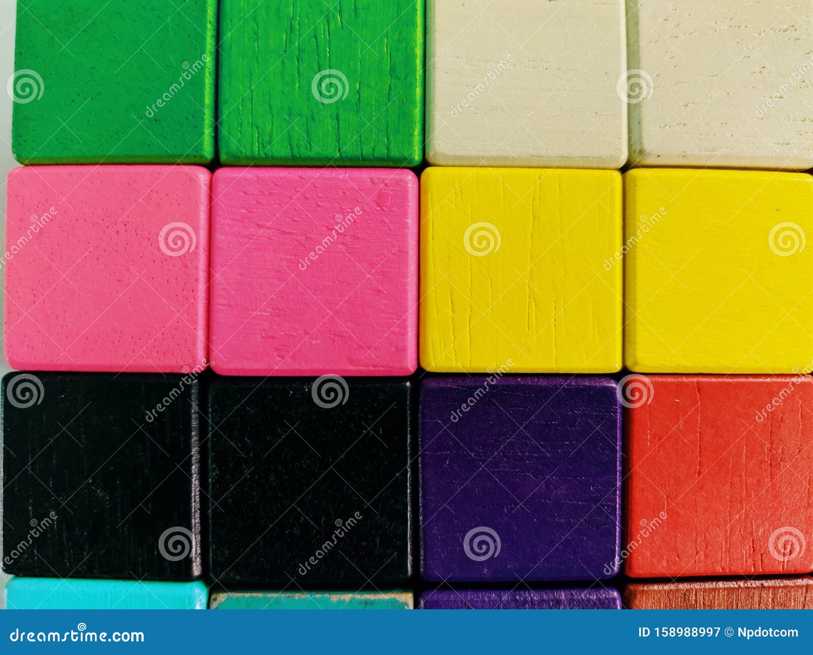 wooden blog square grid.sticks to painted colorful to array different levels to create dimensions for decorated on the wall in tha