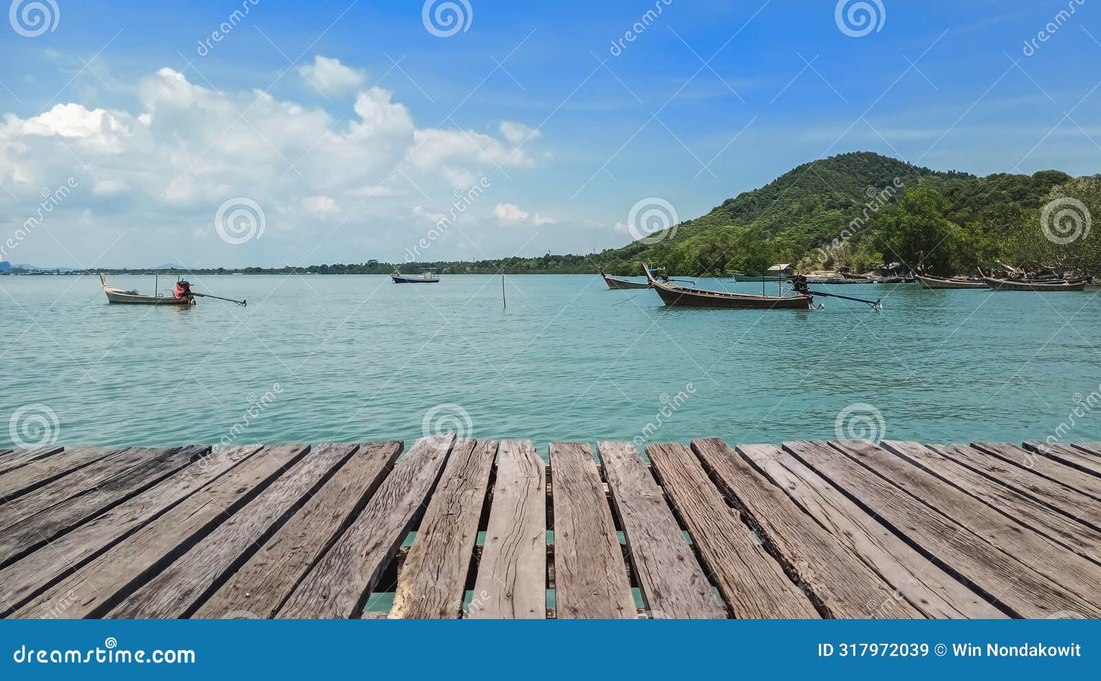 wooden boardwalk over the seaside