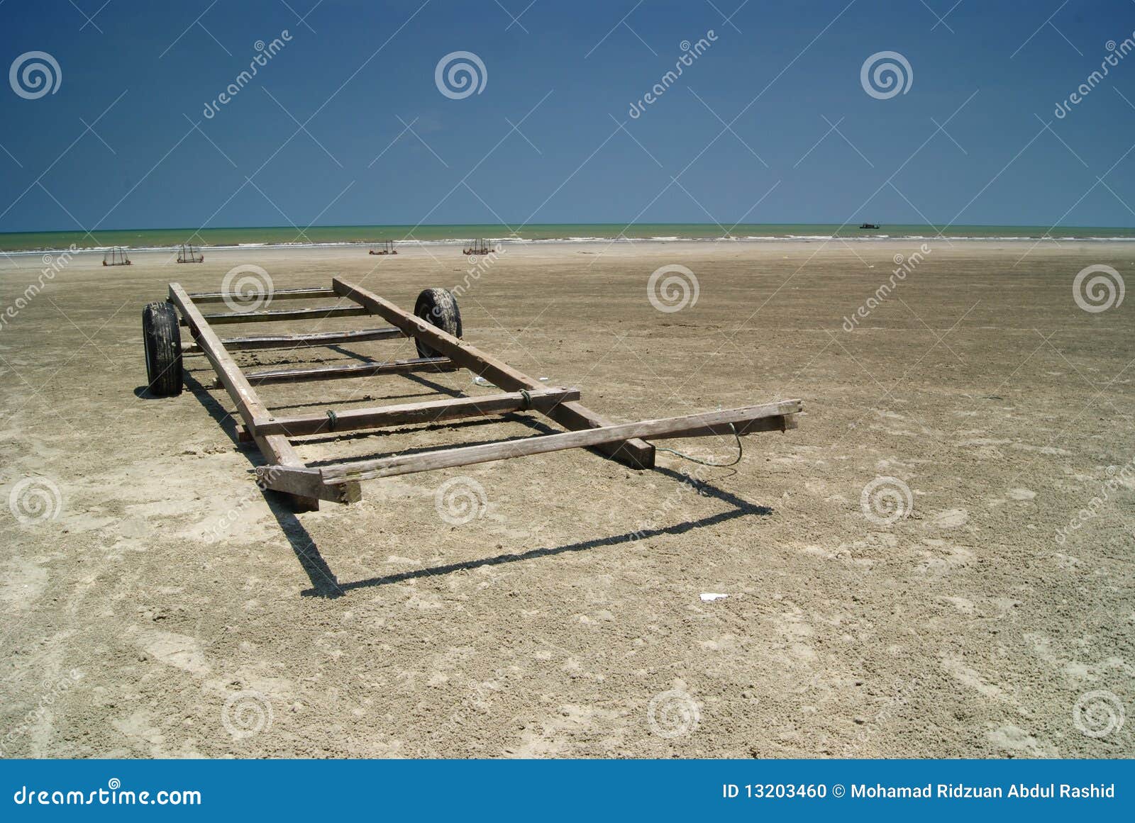 Wooden Boat Trailer on Beach Stock Photo Image of water, foces 13203460